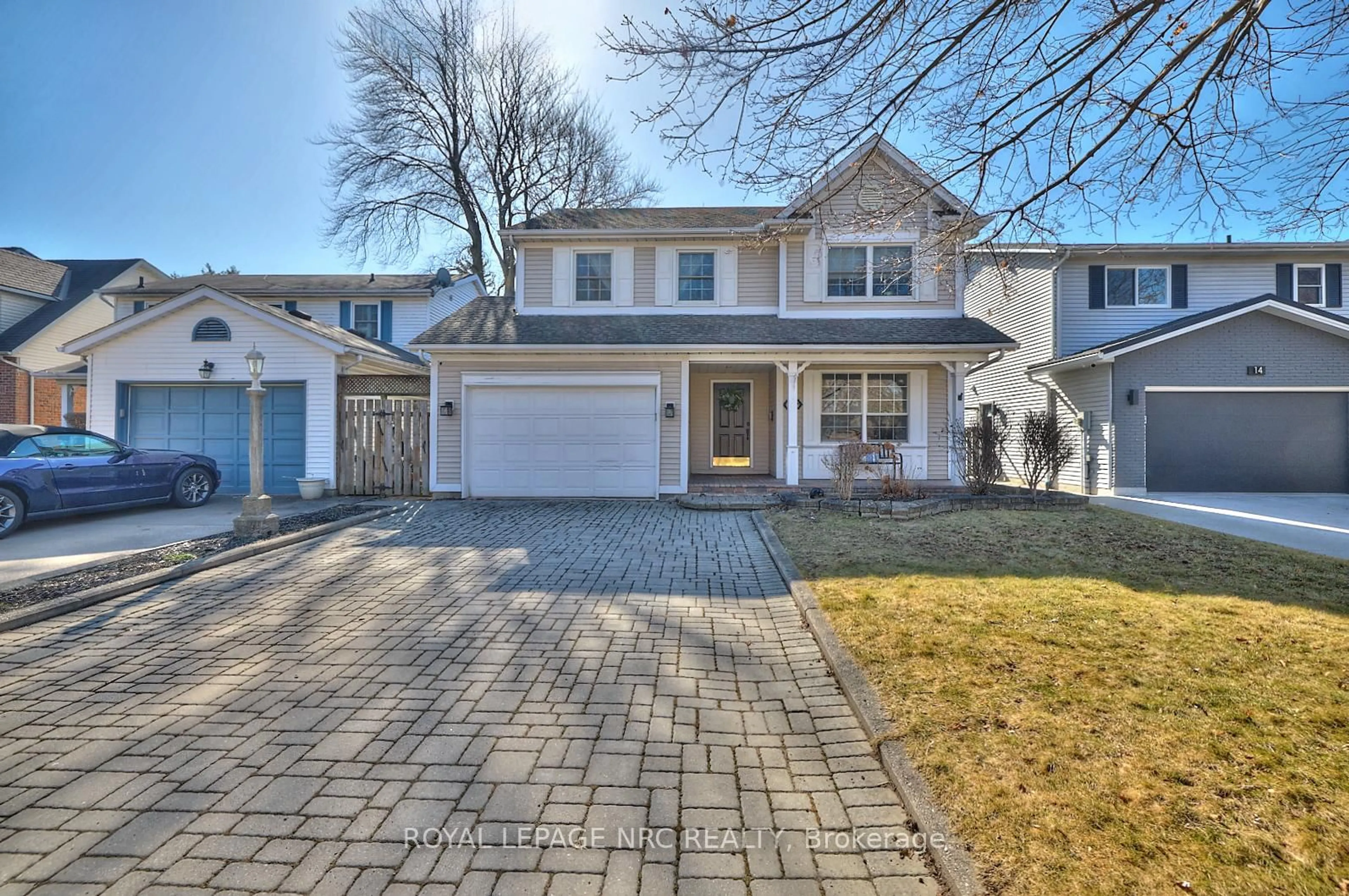 Home with brick exterior material, street for 12 Brigantine Crt, St. Catharines Ontario L2M 7V4
