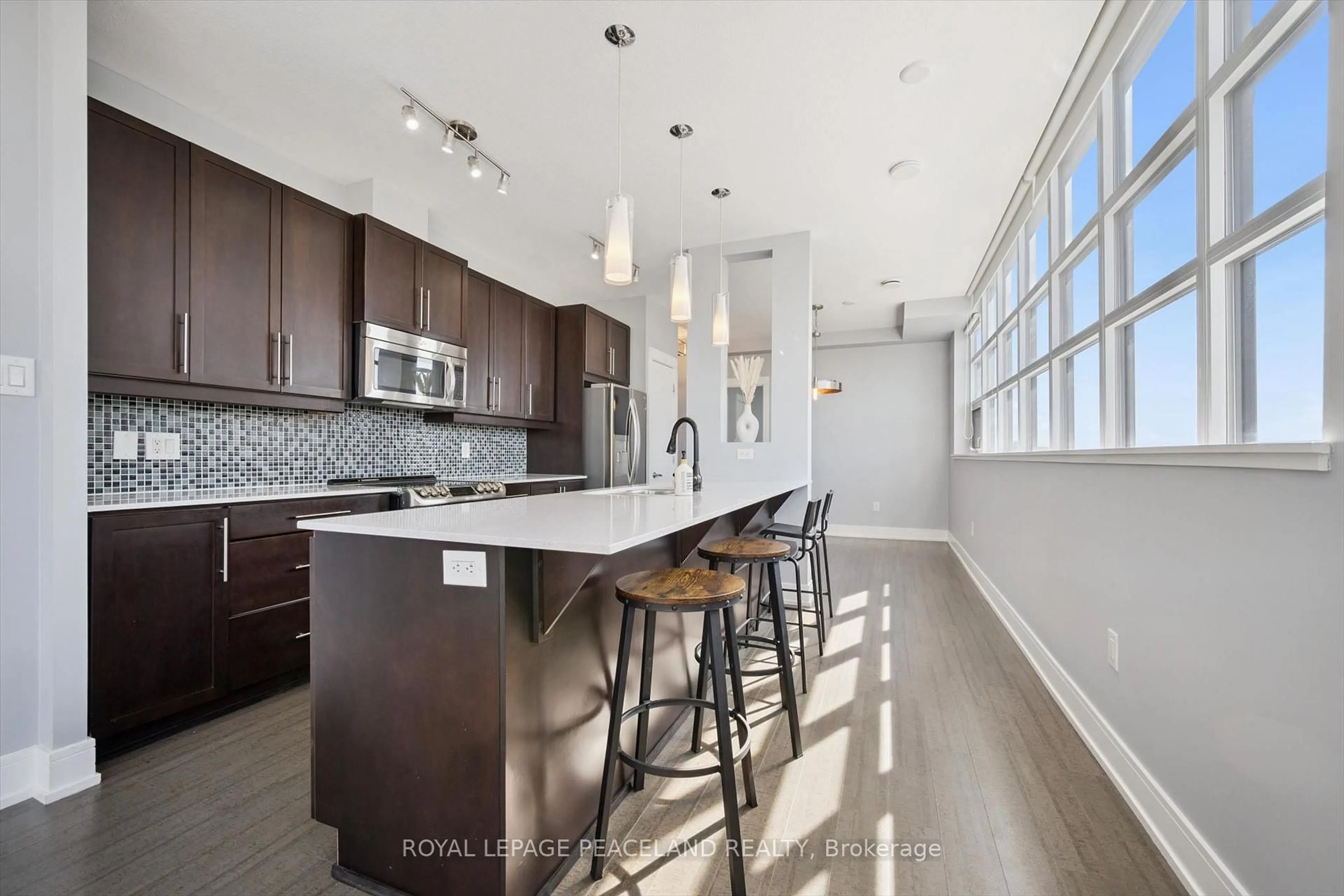 Open concept kitchen, ceramic/tile floor for 112 Benton St #610, Kitchener Ontario N2H 3H6