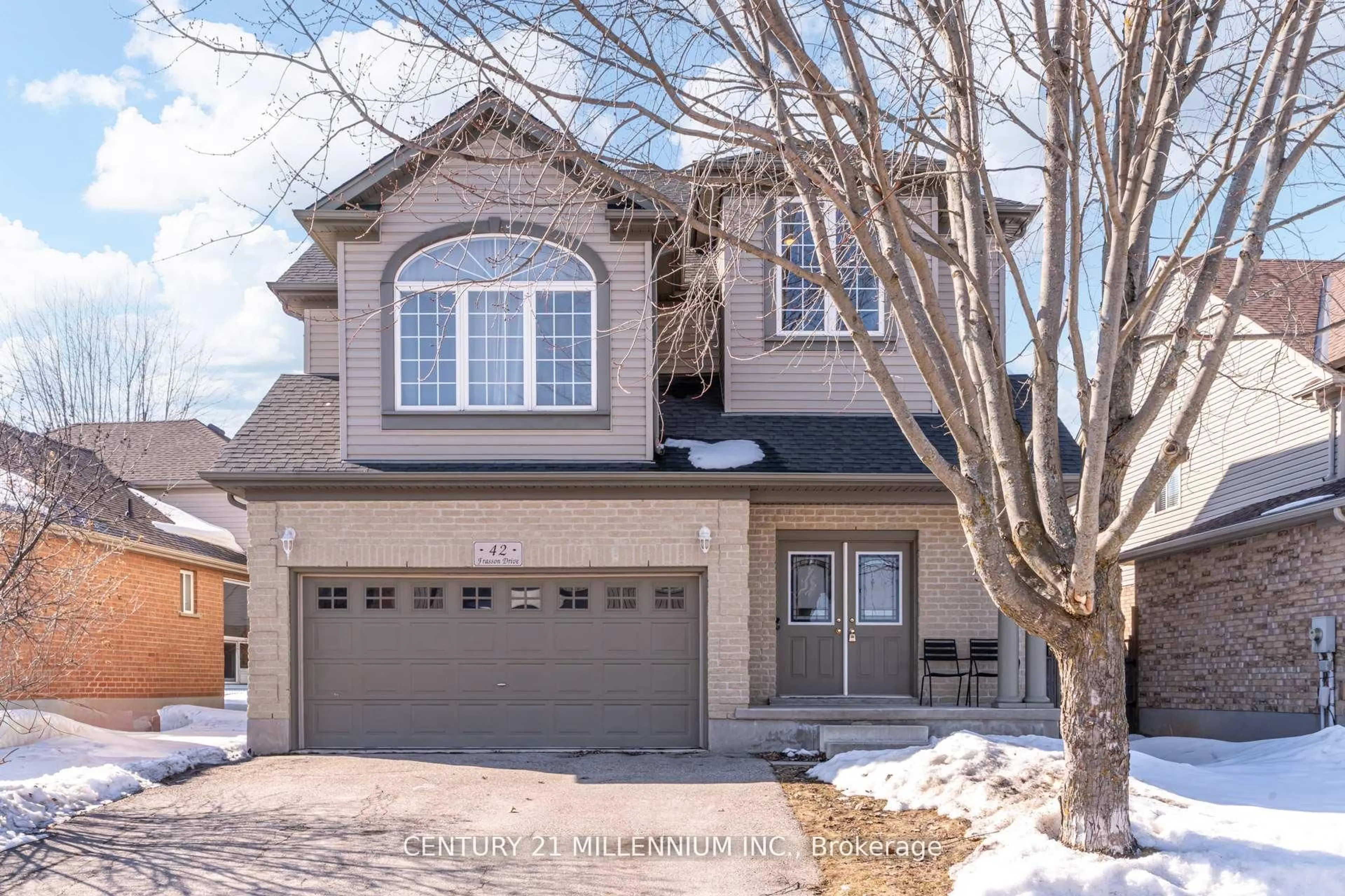 Home with brick exterior material, street for 42 Frasson Dr, Guelph Ontario N1E 7J9