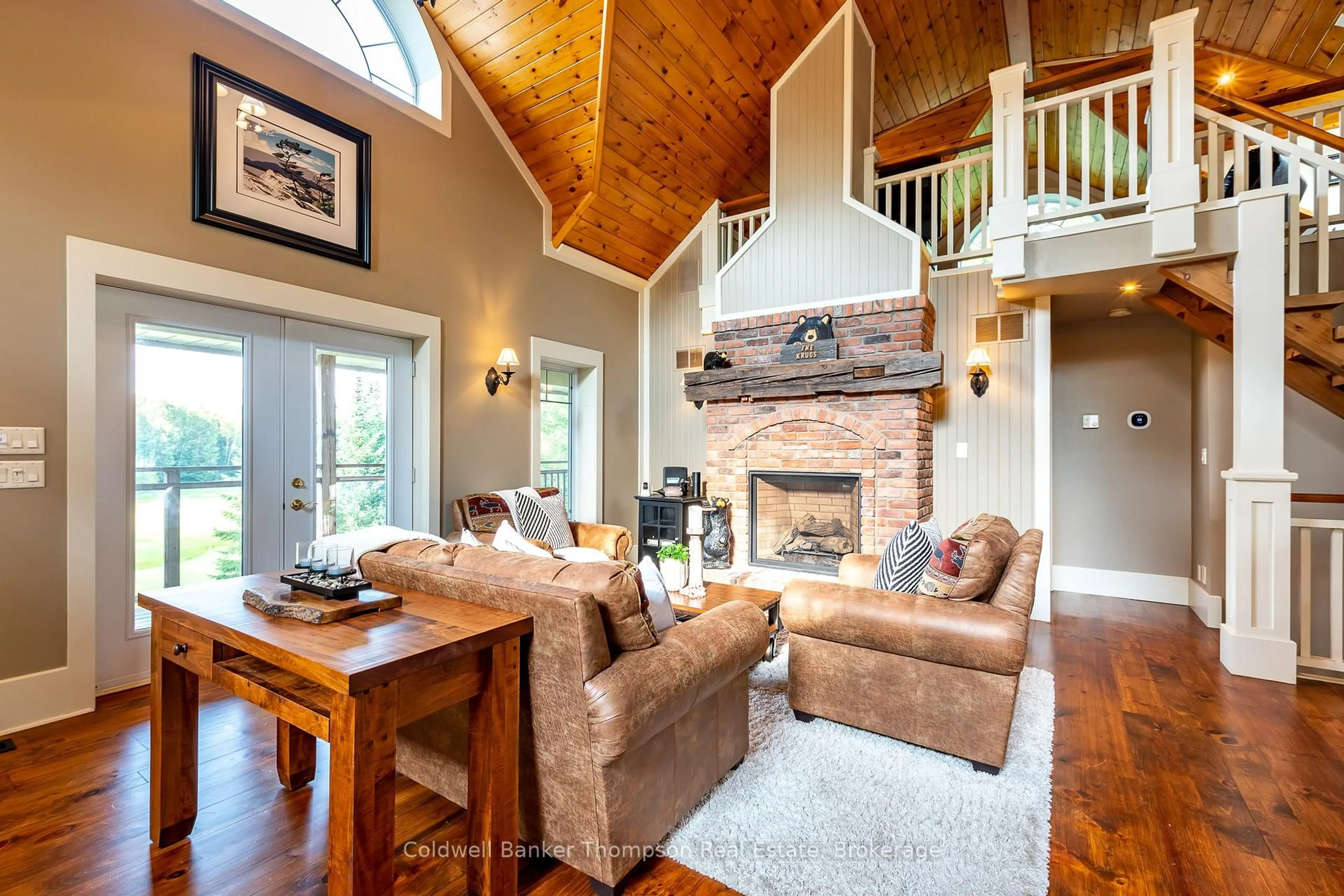 Living room with furniture, unknown for 21 Deerhurst Highlands Dr, Huntsville Ontario P1H 1B1