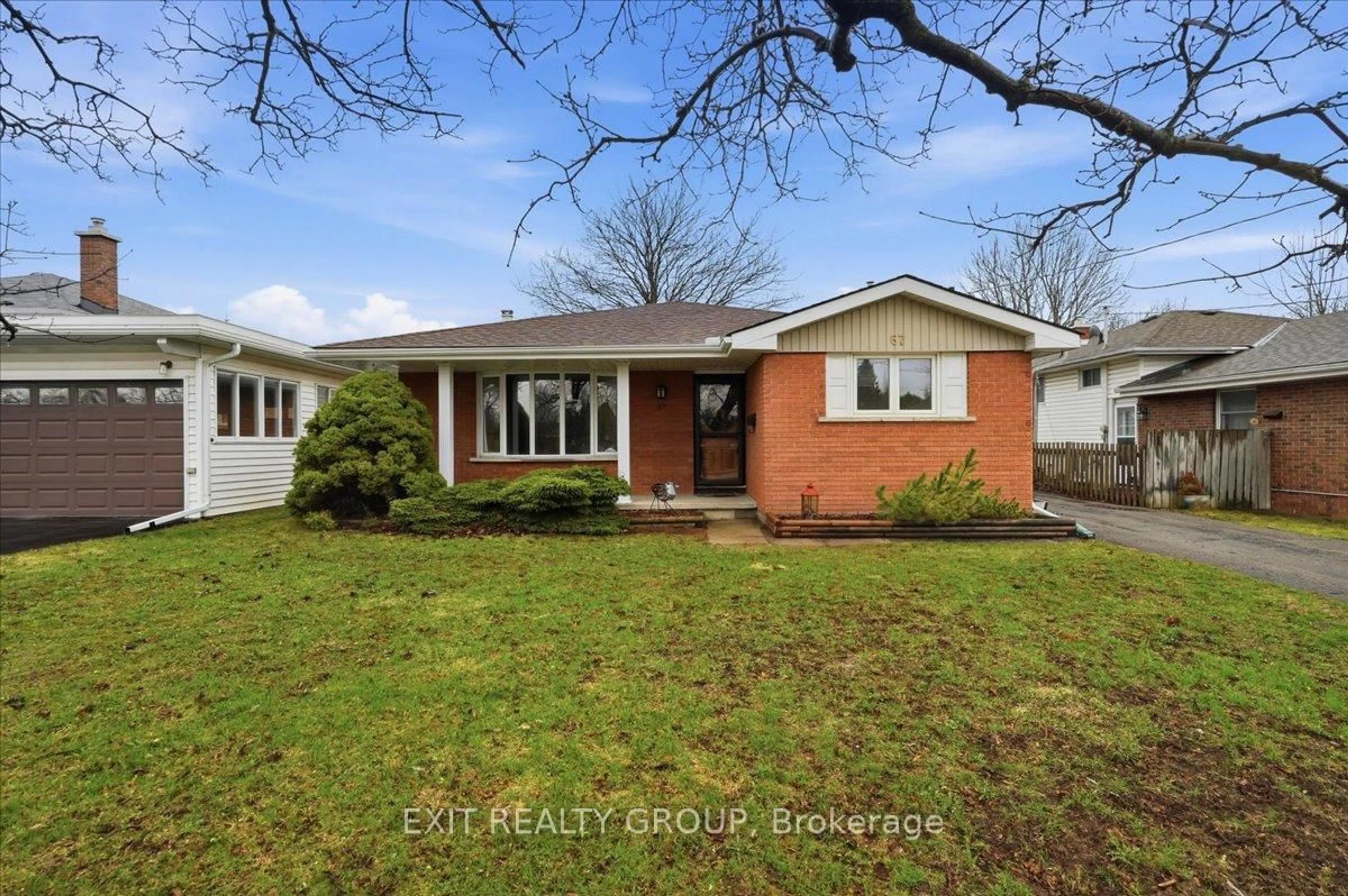 Home with brick exterior material, street for 67 Cascade Blvd, Belleville Ontario K8P 2P5