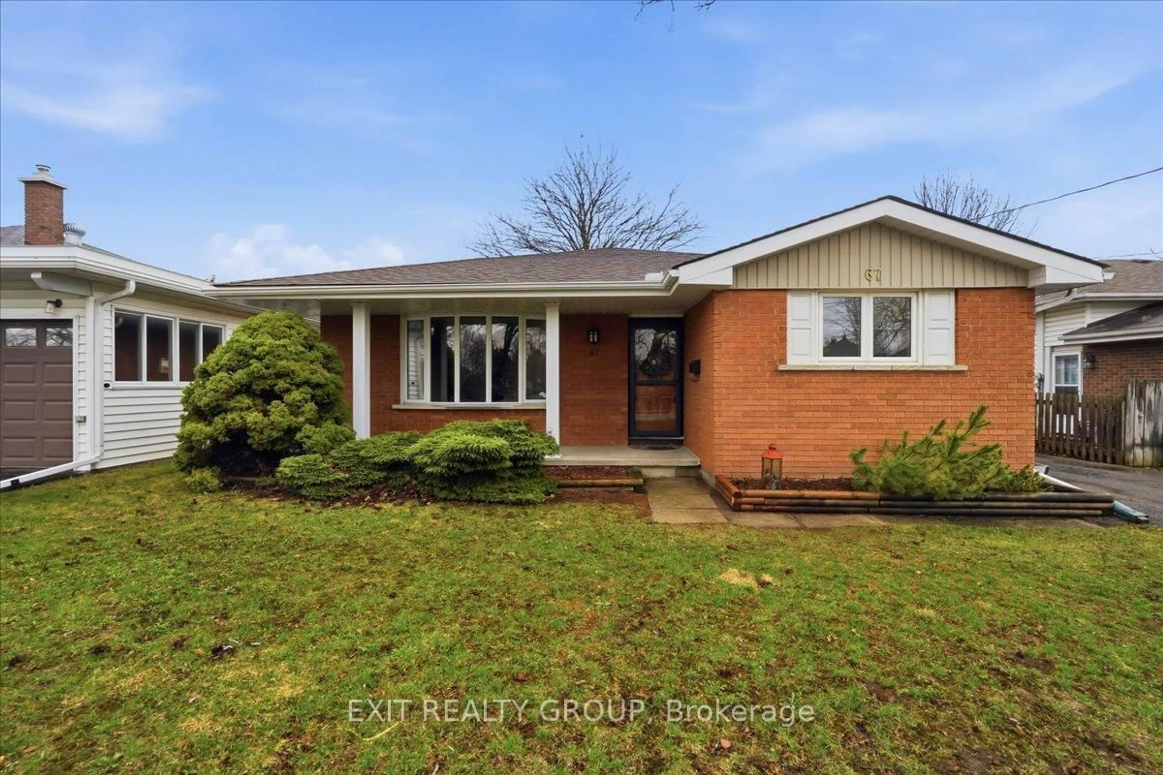 Home with brick exterior material, street for 67 Cascade Blvd, Belleville Ontario K8P 2P5