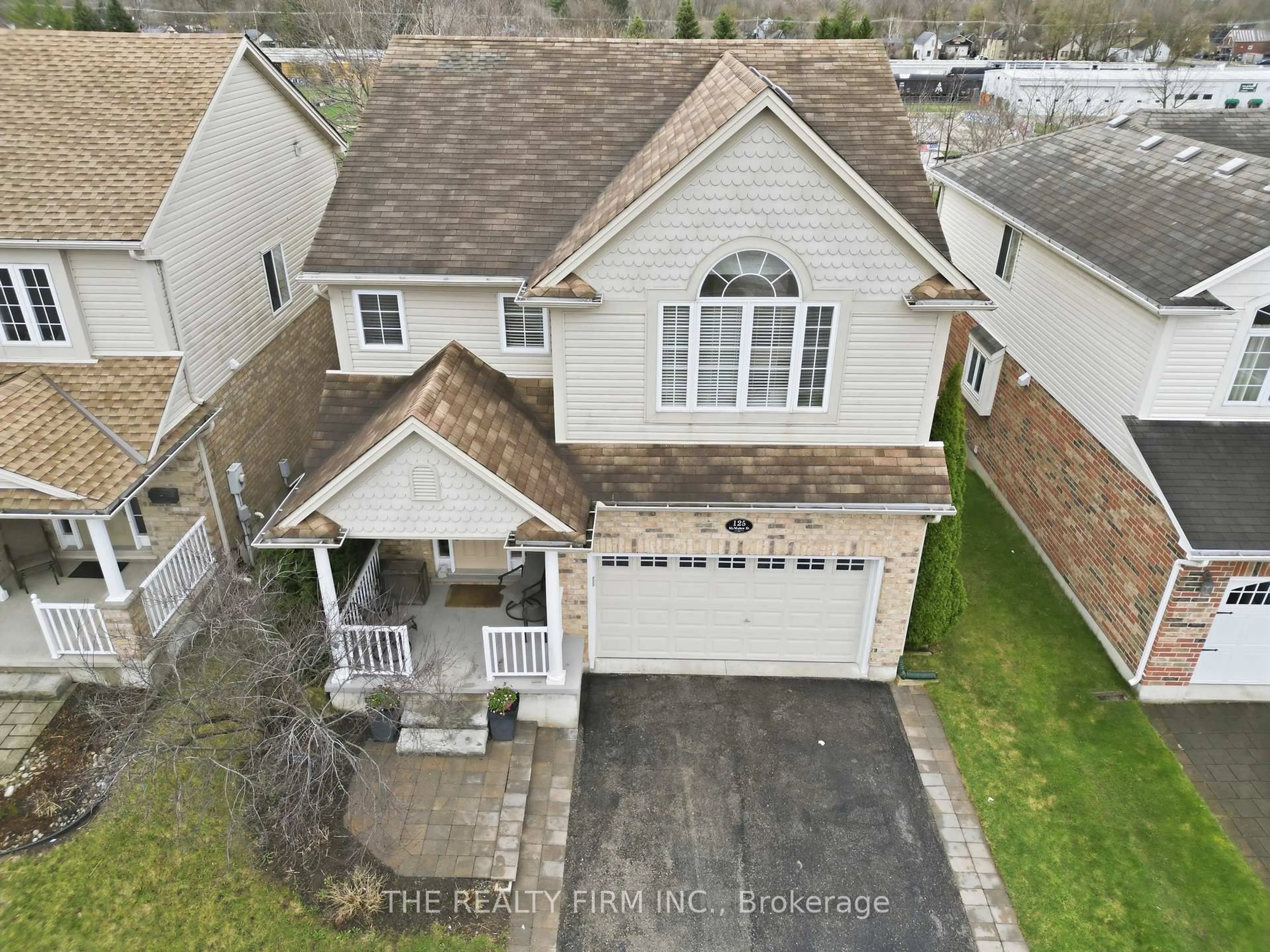 A pic from outside/outdoor area/front of a property/back of a property/a pic from drone, street for 125 Mcmahen St, London East Ontario N5Y 0A2