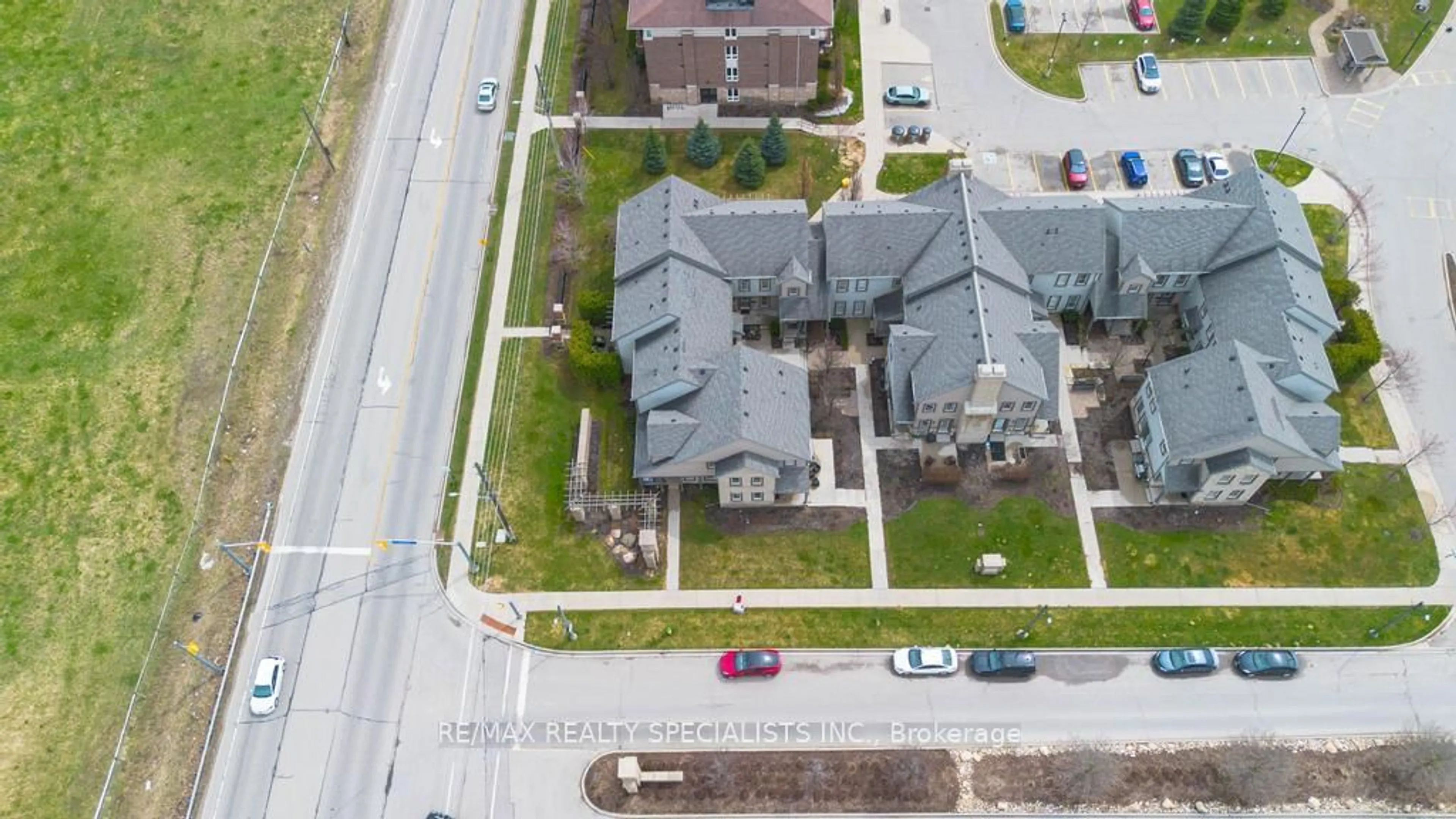 A pic from outside/outdoor area/front of a property/back of a property/a pic from drone, street for 101 Frederick Dr #2, Guelph Ontario N1L 0K7