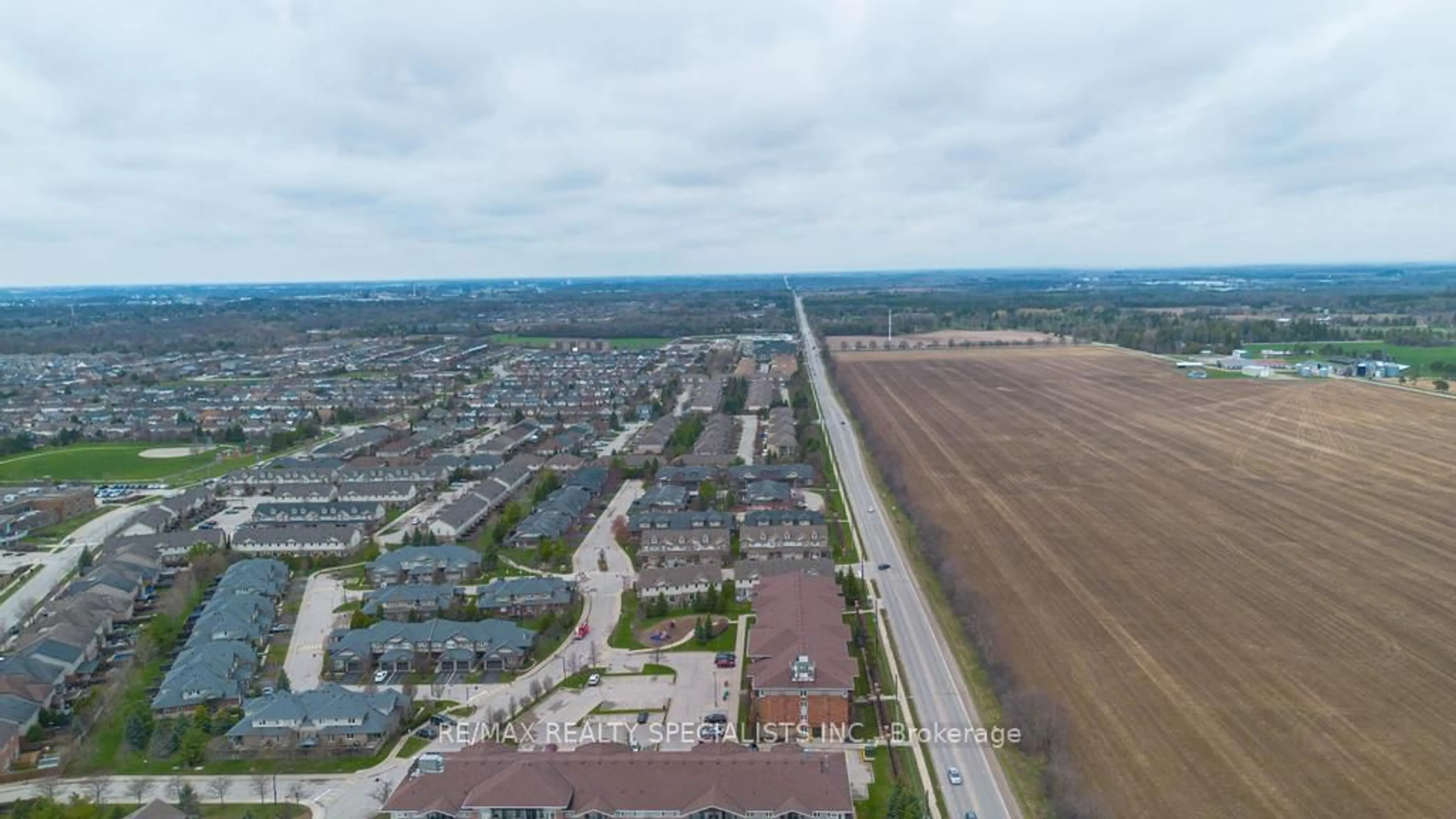 A pic from outside/outdoor area/front of a property/back of a property/a pic from drone, street for 101 Frederick Dr #2, Guelph Ontario N1L 0K7