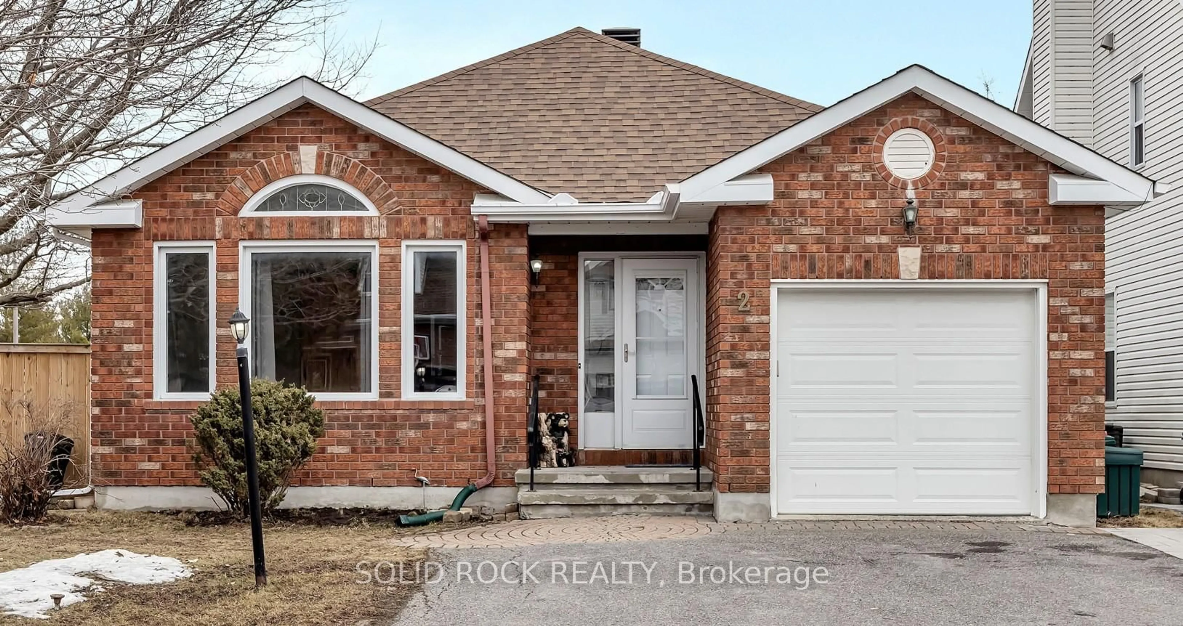 Home with brick exterior material, street for 2 Newborough Cres, Ottawa Ontario K2G 6A2