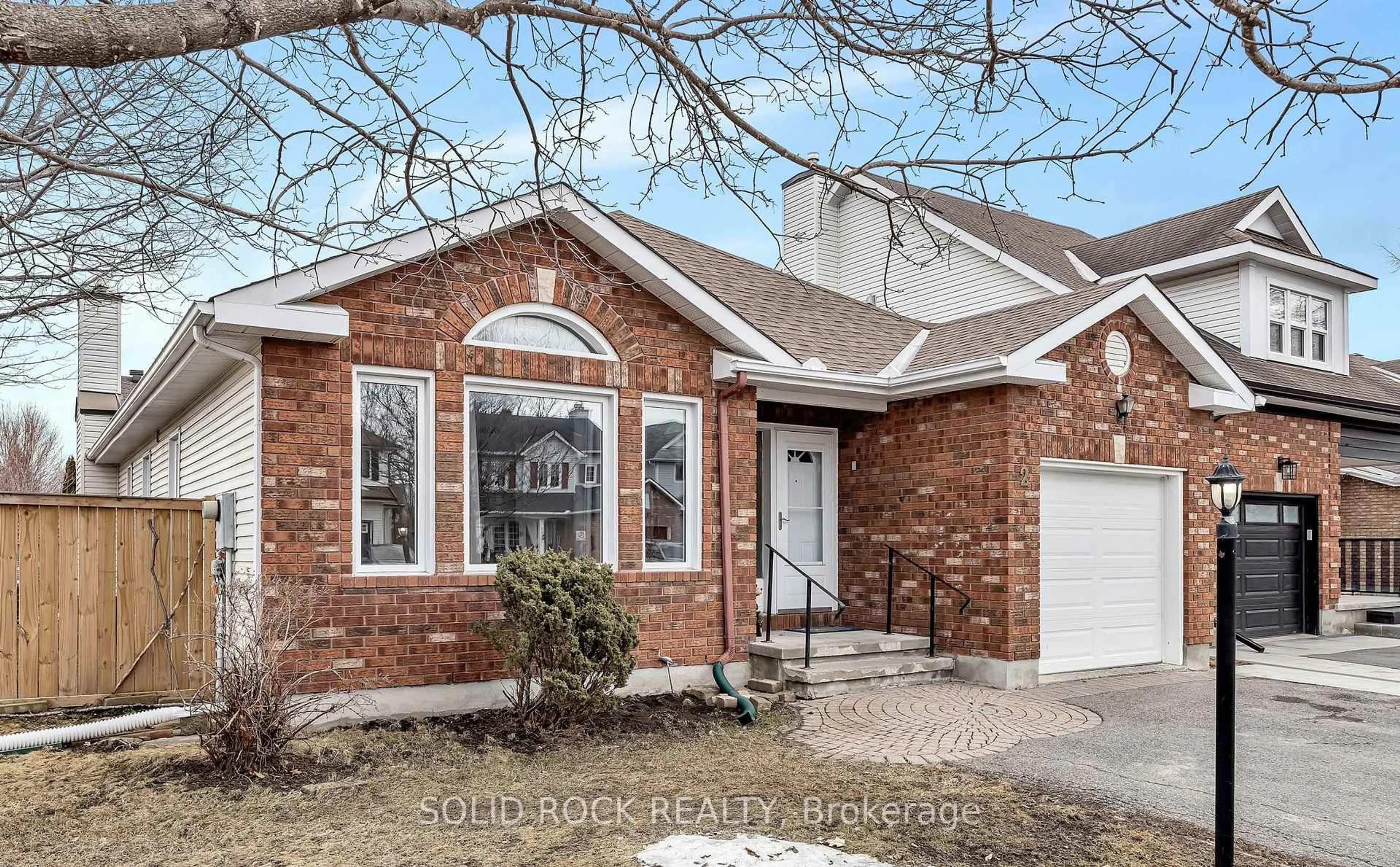 Home with brick exterior material, street for 2 Newborough Cres, Ottawa Ontario K2G 6A2