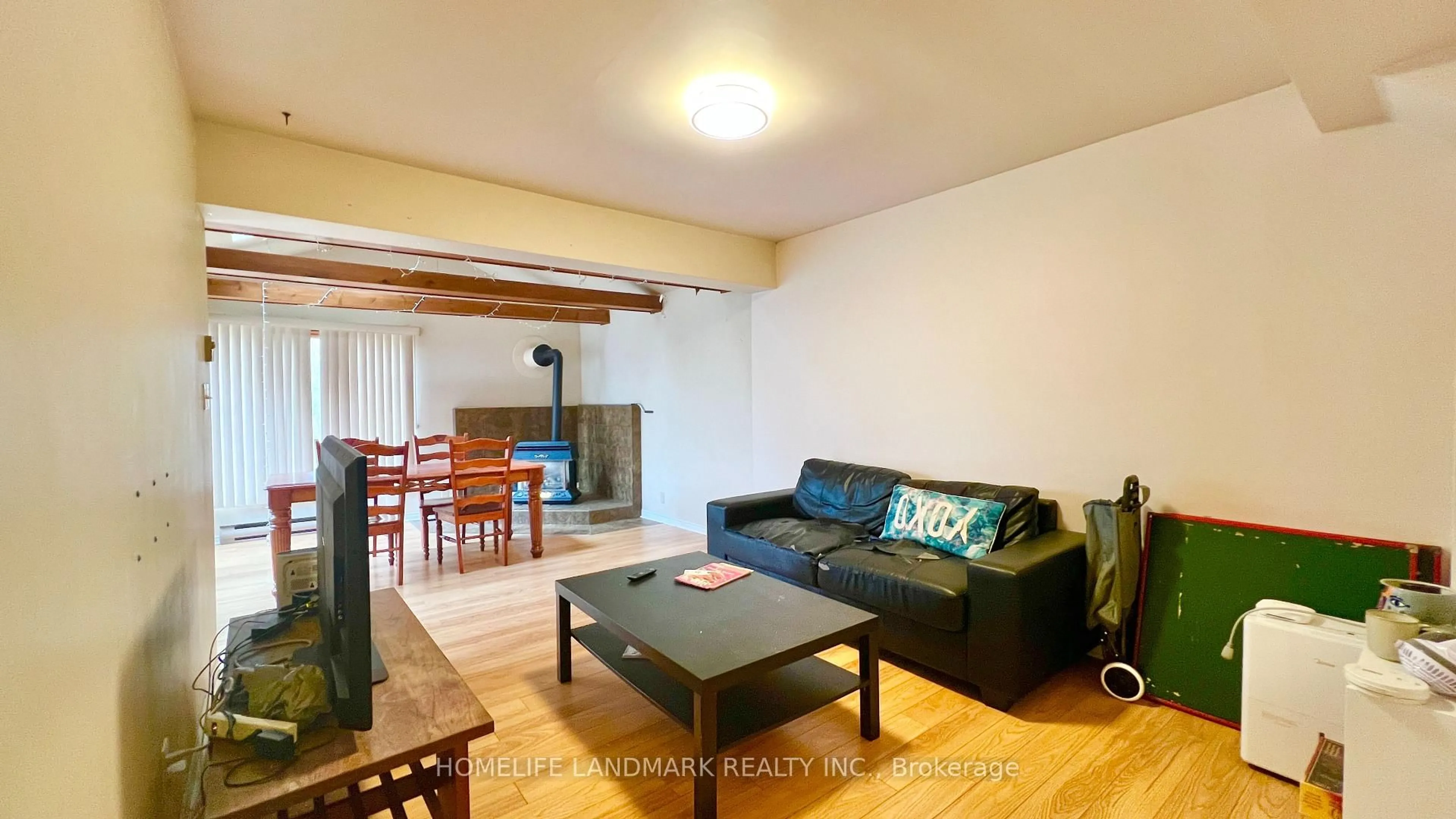 Living room with furniture, wood/laminate floor for 84 Binkley Cres, Hamilton Ontario L8S 3L1