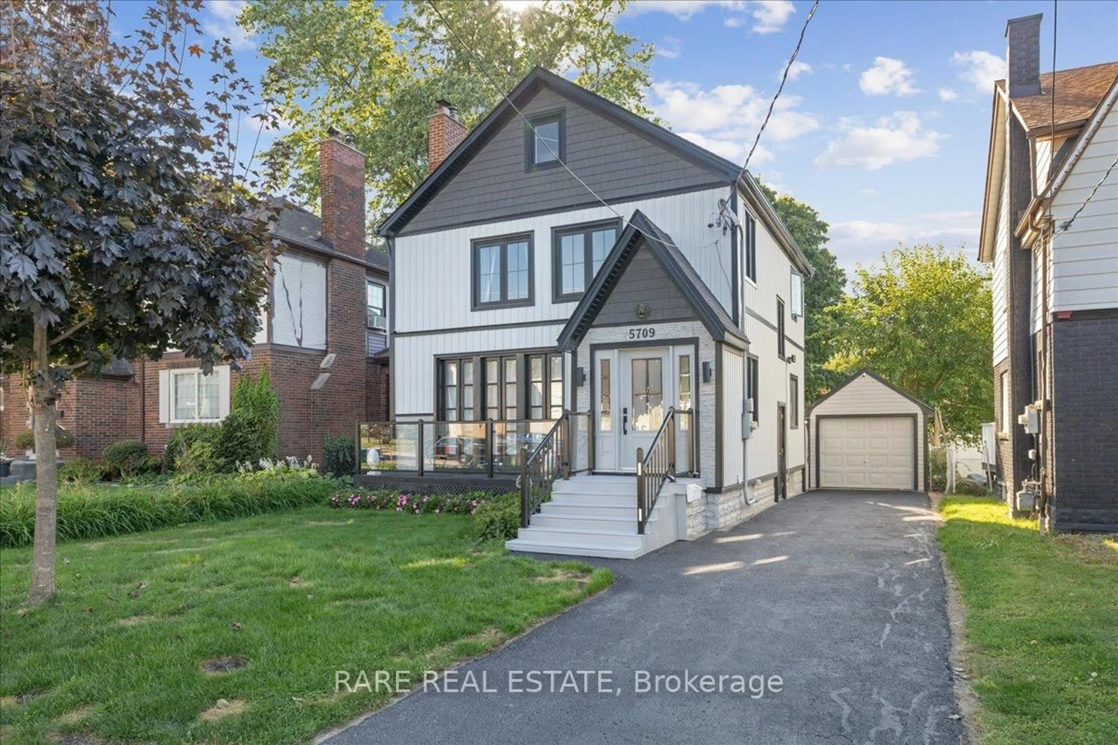 Home with brick exterior material, street for 5709 Dorchester Rd, Niagara Falls Ontario L2G 5S5