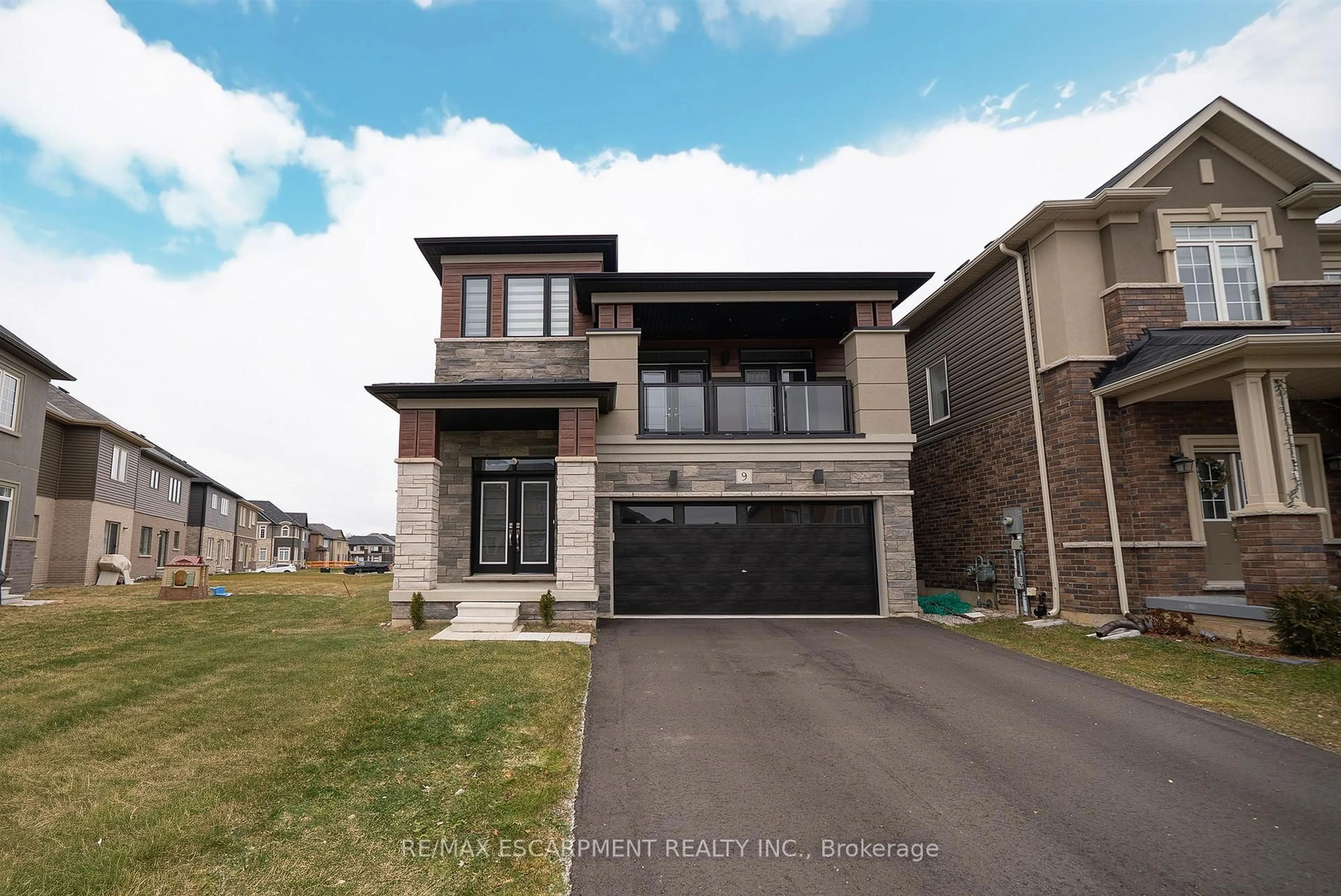 Home with brick exterior material, street for 9 Tarrison St, Brantford Ontario N3V 0B1