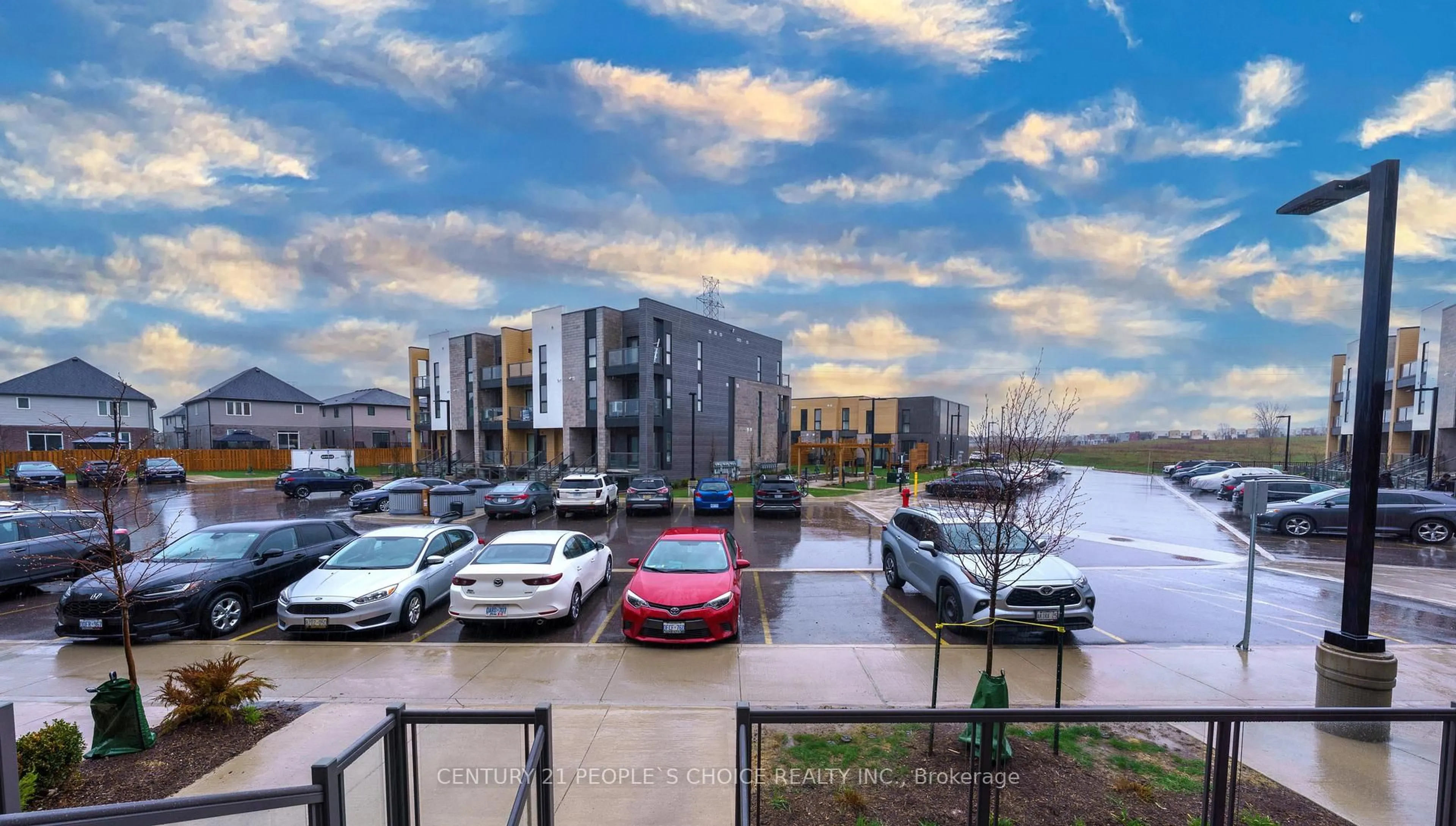 A pic from outside/outdoor area/front of a property/back of a property/a pic from drone, city buildings view from balcony for 261 Woodbine Ave ##48, Kitchener Ontario N2R 0S7