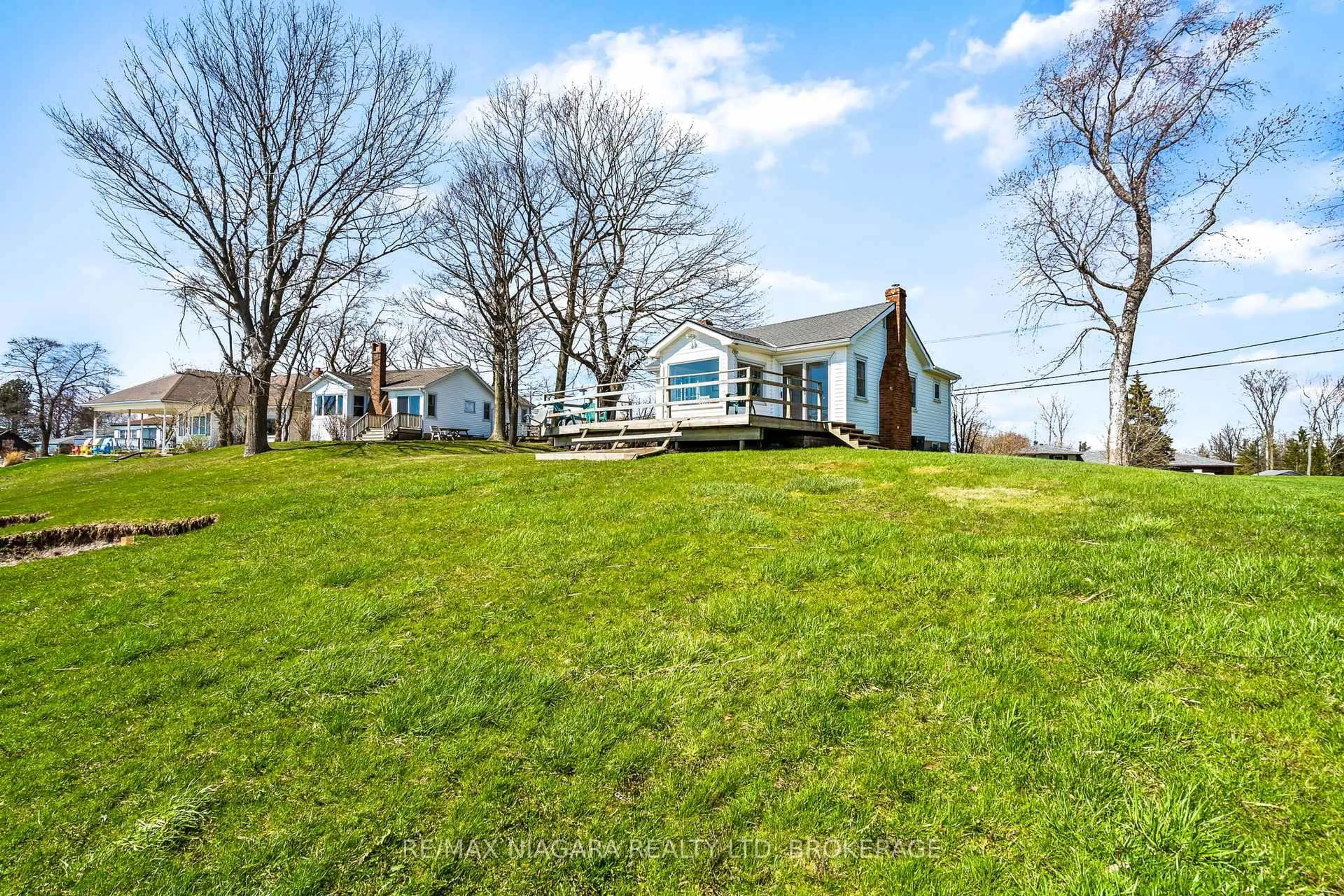 A pic from outside/outdoor area/front of a property/back of a property/a pic from drone, water/lake/river/ocean view for 13165 Lakeshore Rd, Wainfleet Ontario L0S 1V0