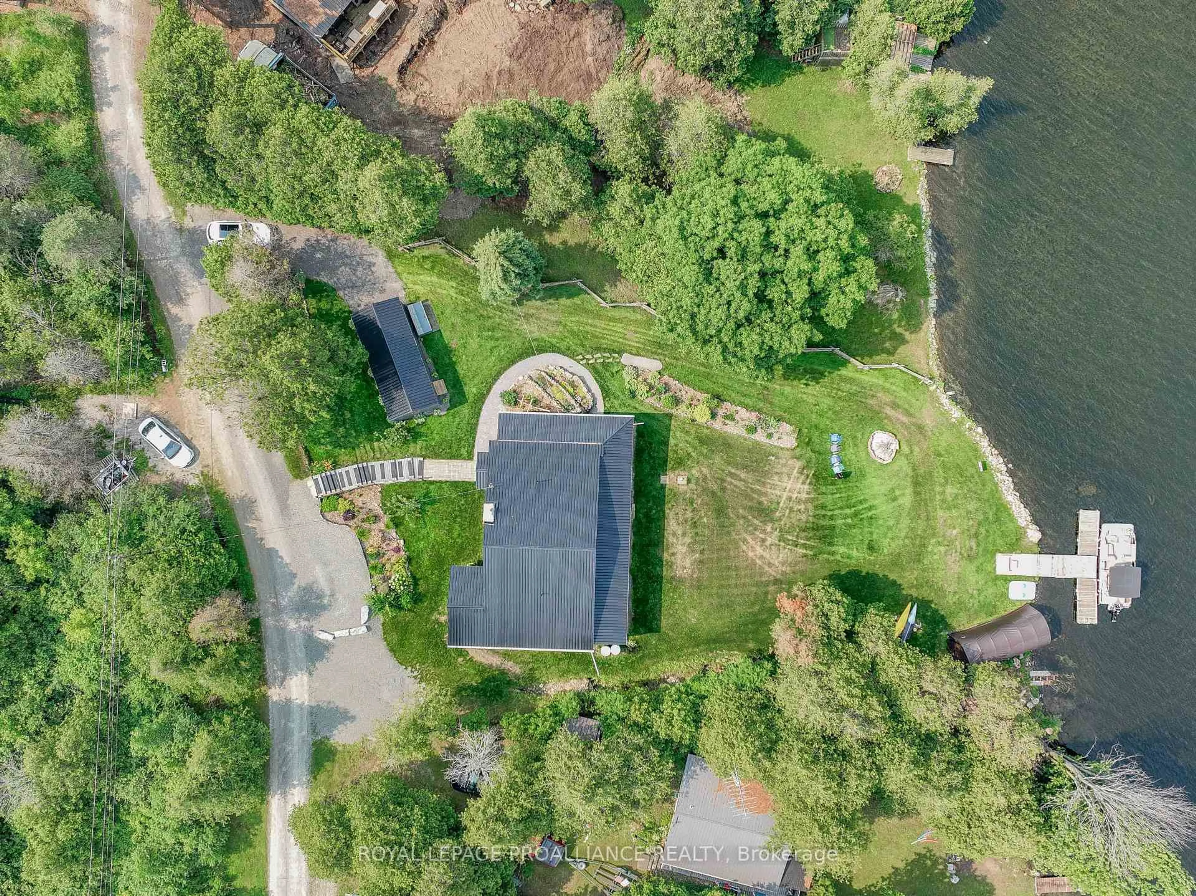 A pic from outside/outdoor area/front of a property/back of a property/a pic from drone, water/lake/river/ocean view for 40 Chant Terr, Front of Yonge Ontario K0E 1R0