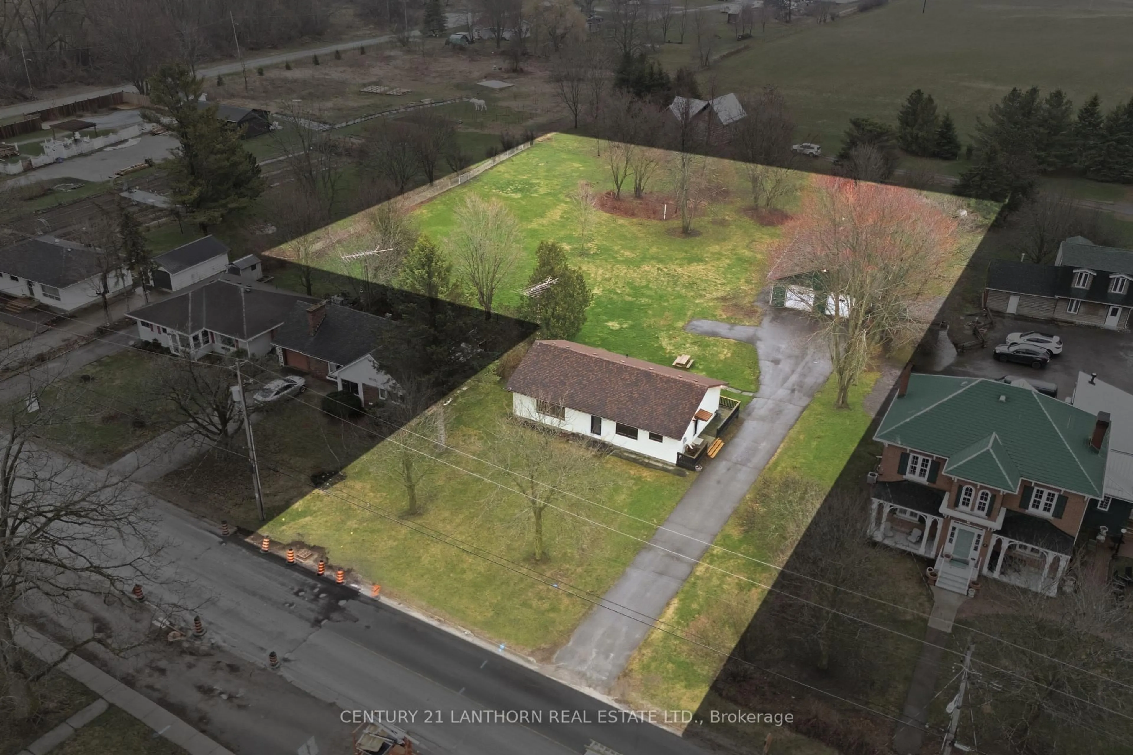 A pic from outside/outdoor area/front of a property/back of a property/a pic from drone, street for 425 Bloomfield Main St, Prince Edward County Ontario K0K 1G0