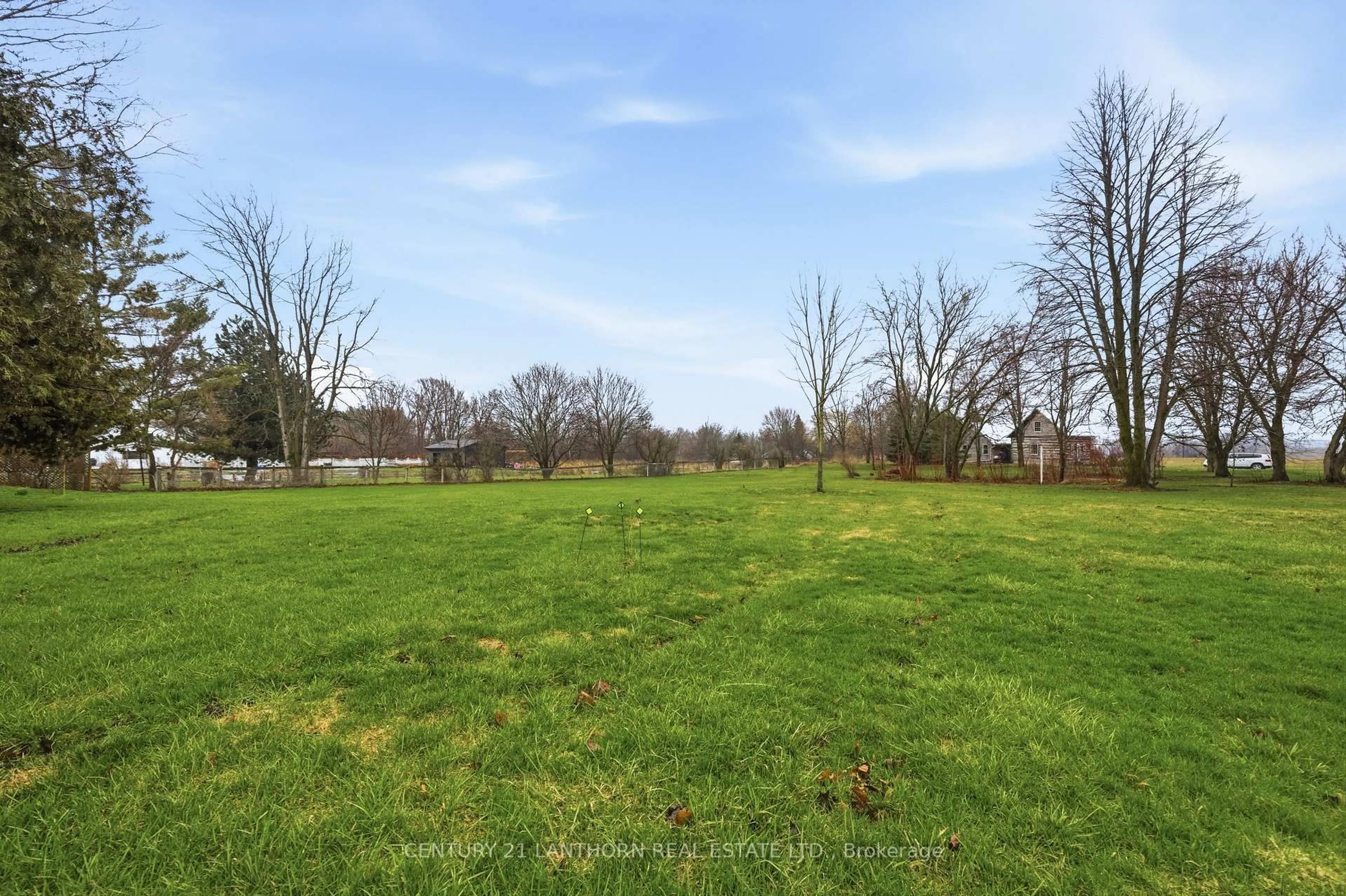 A pic from outside/outdoor area/front of a property/back of a property/a pic from drone, forest/trees view for 425 Bloomfield Main St, Prince Edward County Ontario K0K 1G0