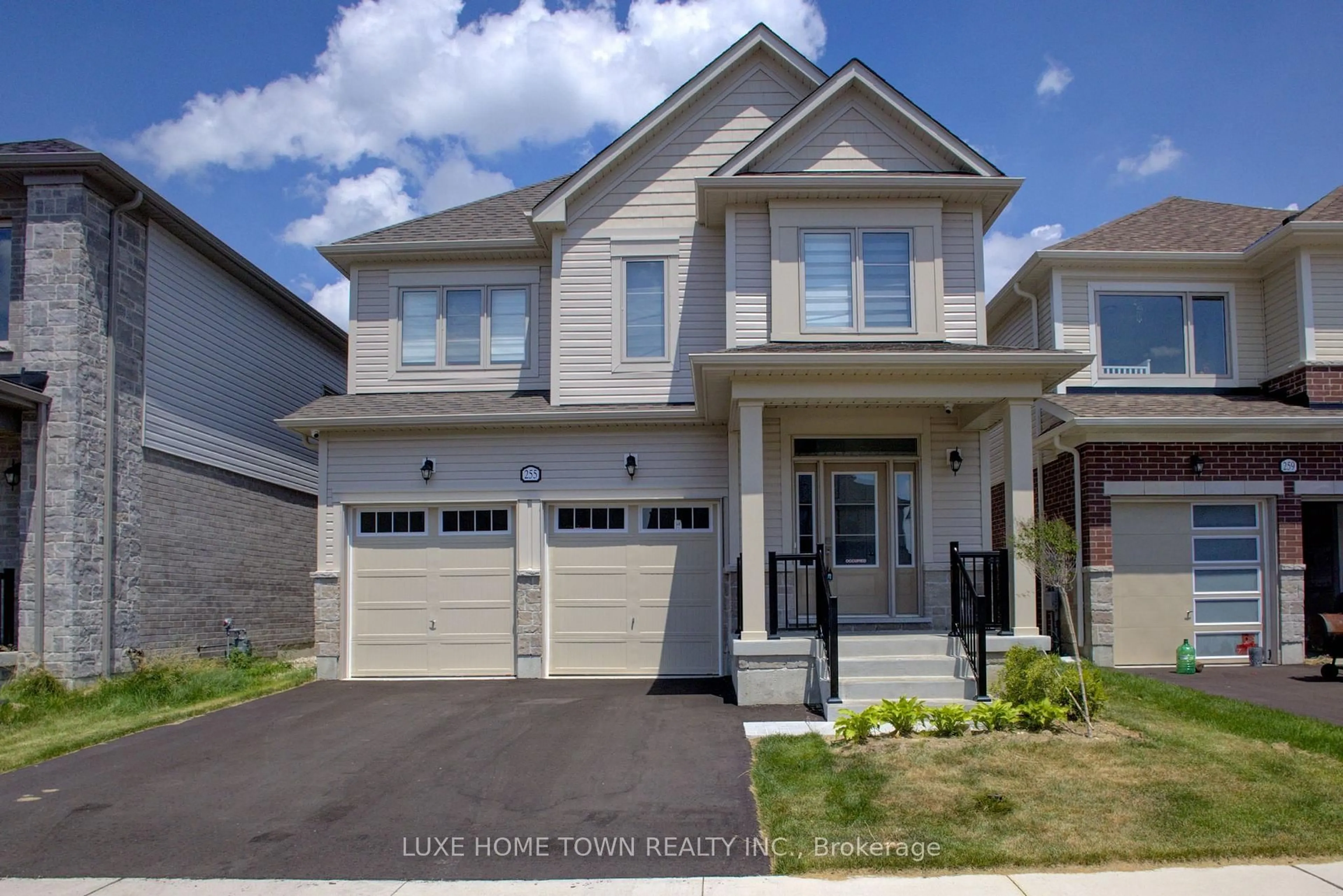 Home with vinyl exterior material, street for 255 Rea Dr, Centre Wellington Ontario N1M 0K1