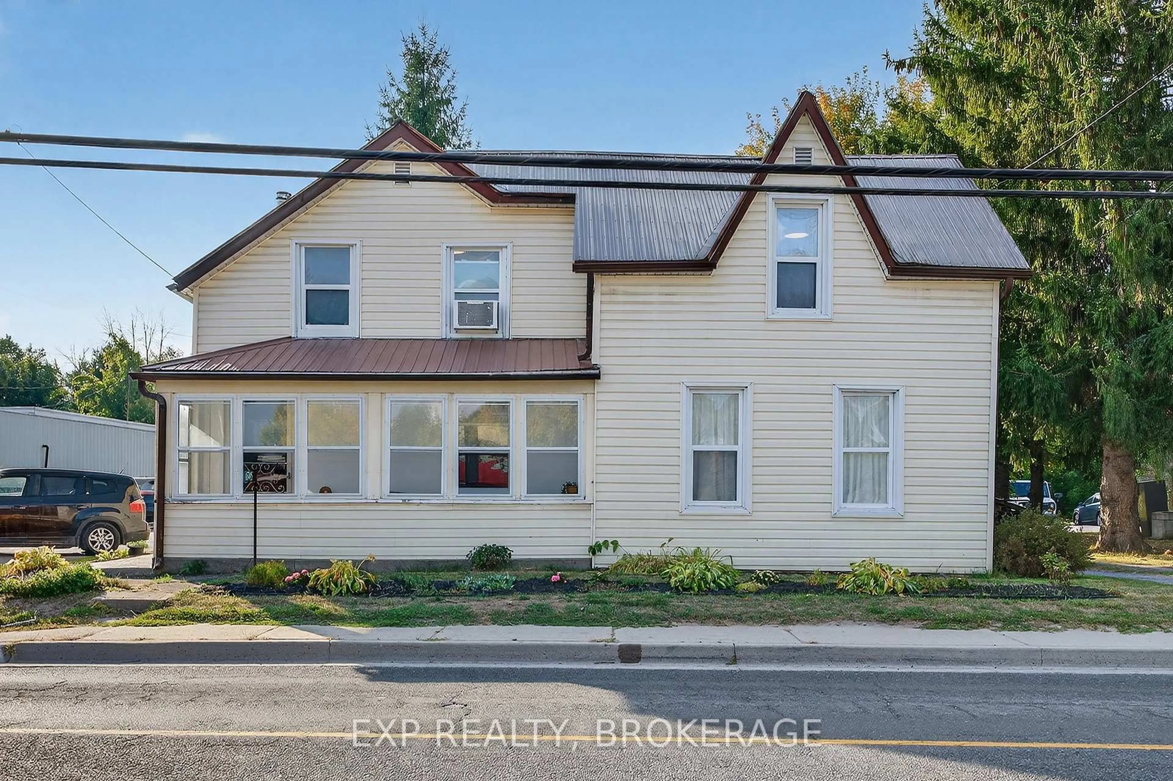 A pic from outside/outdoor area/front of a property/back of a property/a pic from drone, street for 6745 ROAD 38, Frontenac Ontario K0H 0B8