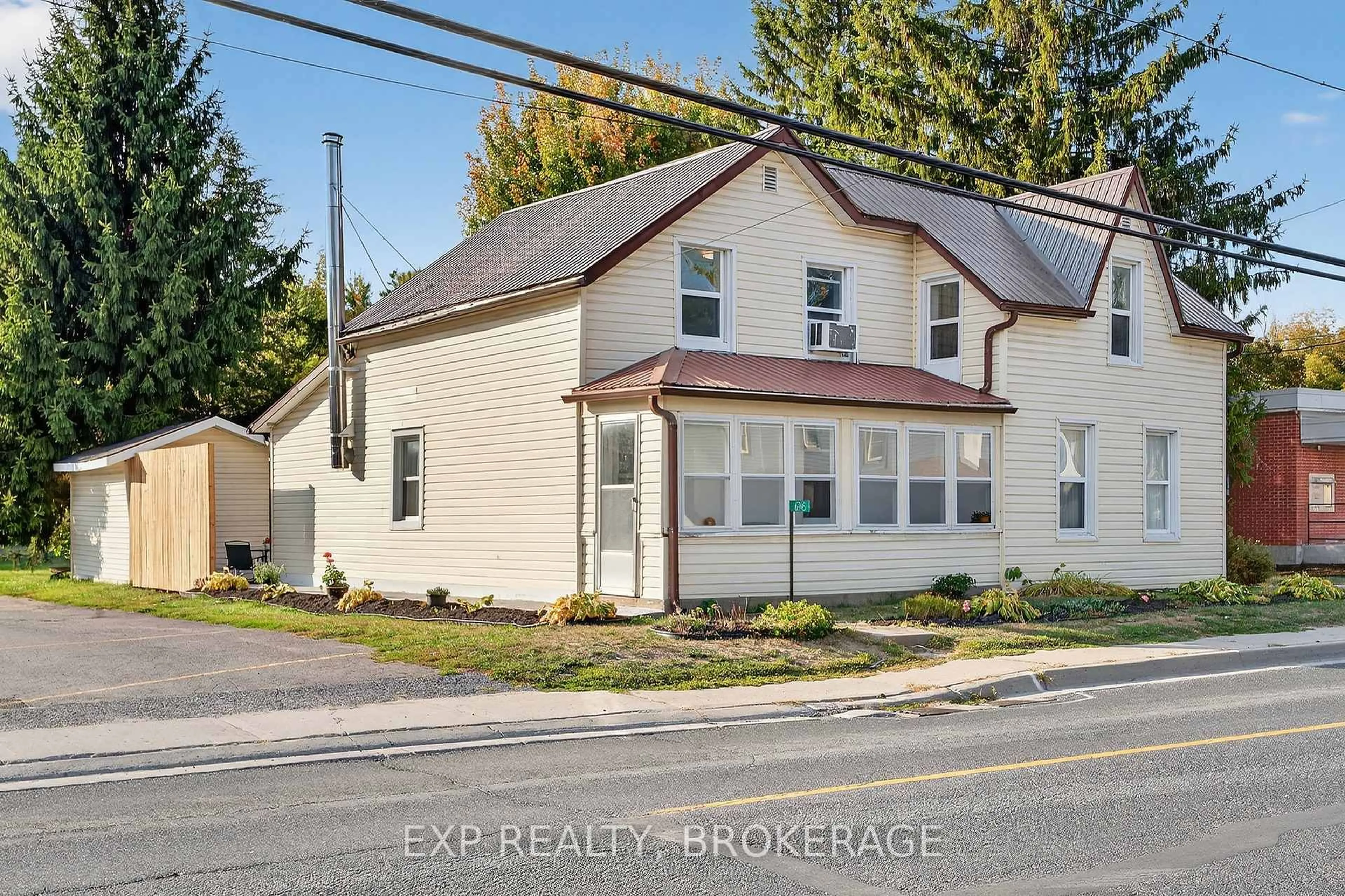 A pic from outside/outdoor area/front of a property/back of a property/a pic from drone, street for 6745 ROAD 38, Frontenac Ontario K0H 0B8