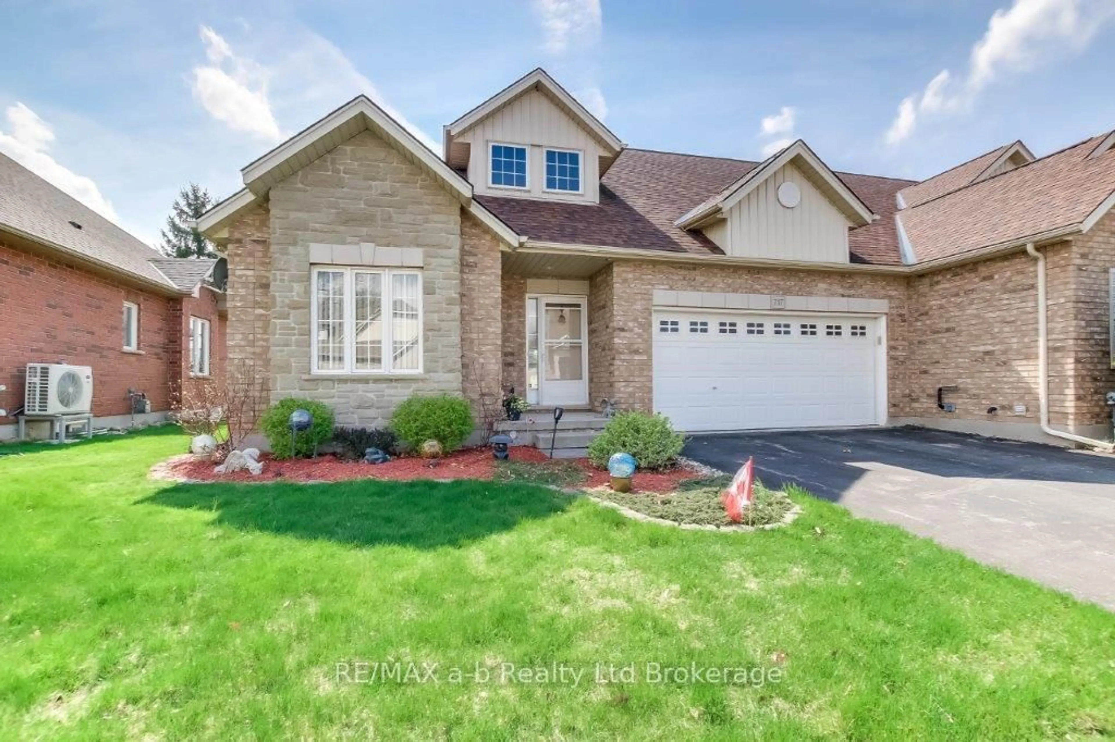 Home with brick exterior material, street for 717 Garden Court Cres, Woodstock Ontario N4T 0A2
