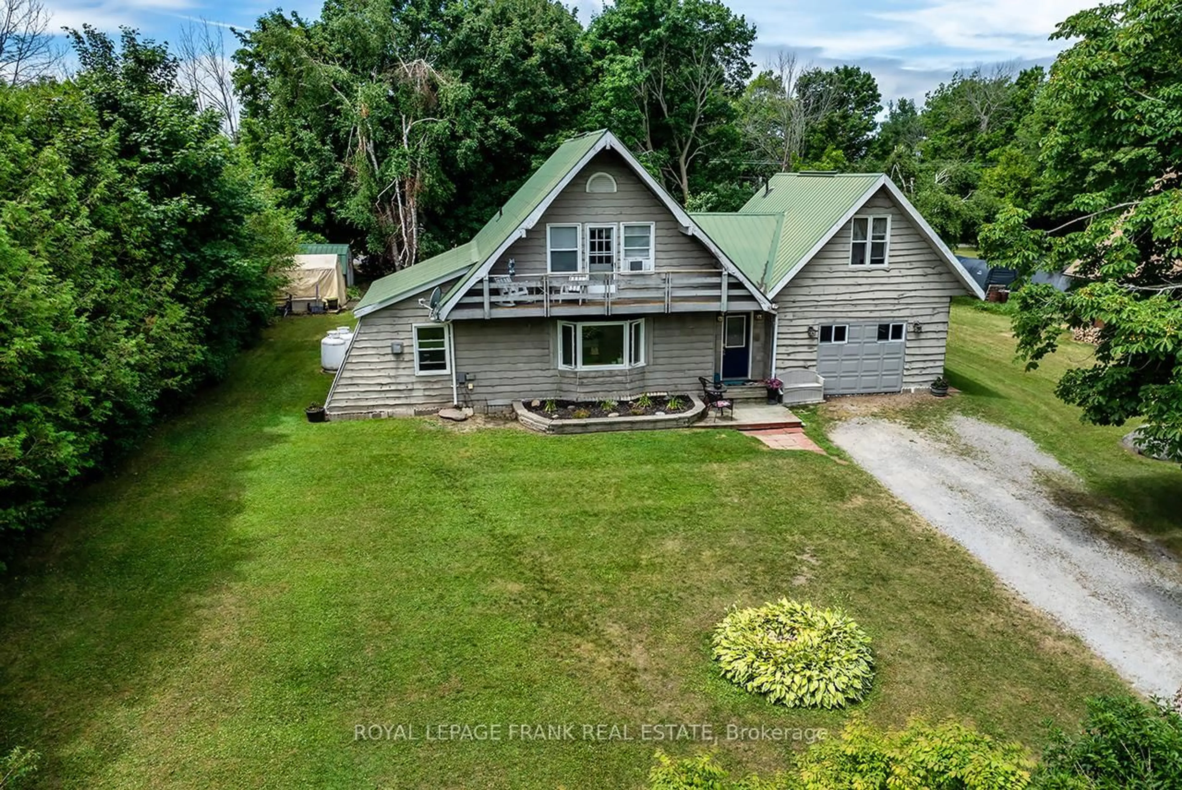 A pic from outside/outdoor area/front of a property/back of a property/a pic from drone, unknown for 16 Shelley Dr, Kawartha Lakes Ontario K0M 2C0