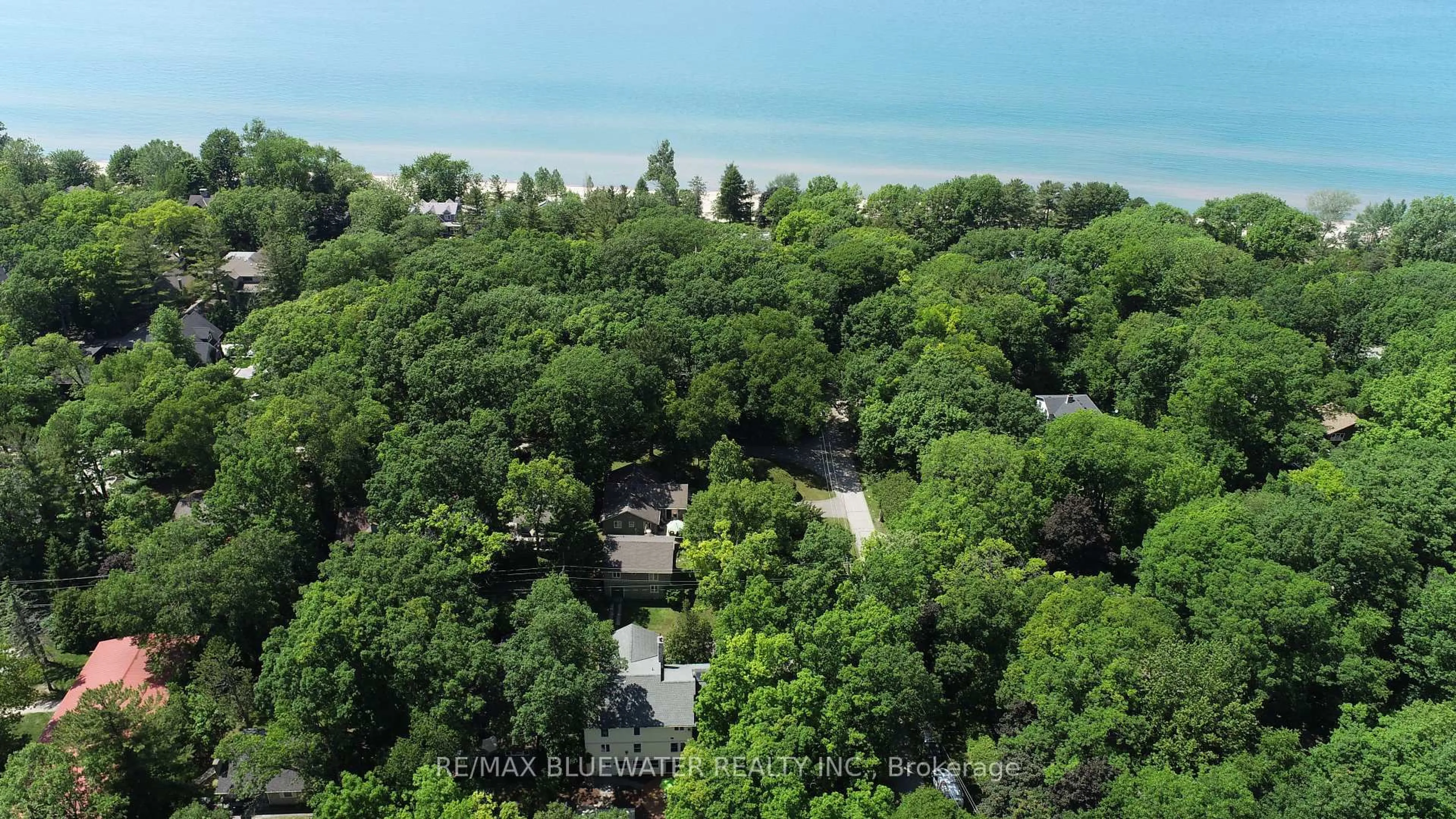 A pic from outside/outdoor area/front of a property/back of a property/a pic from drone, water/lake/river/ocean view for 5 PHILLIP St, South Huron Ontario N0M 1T0