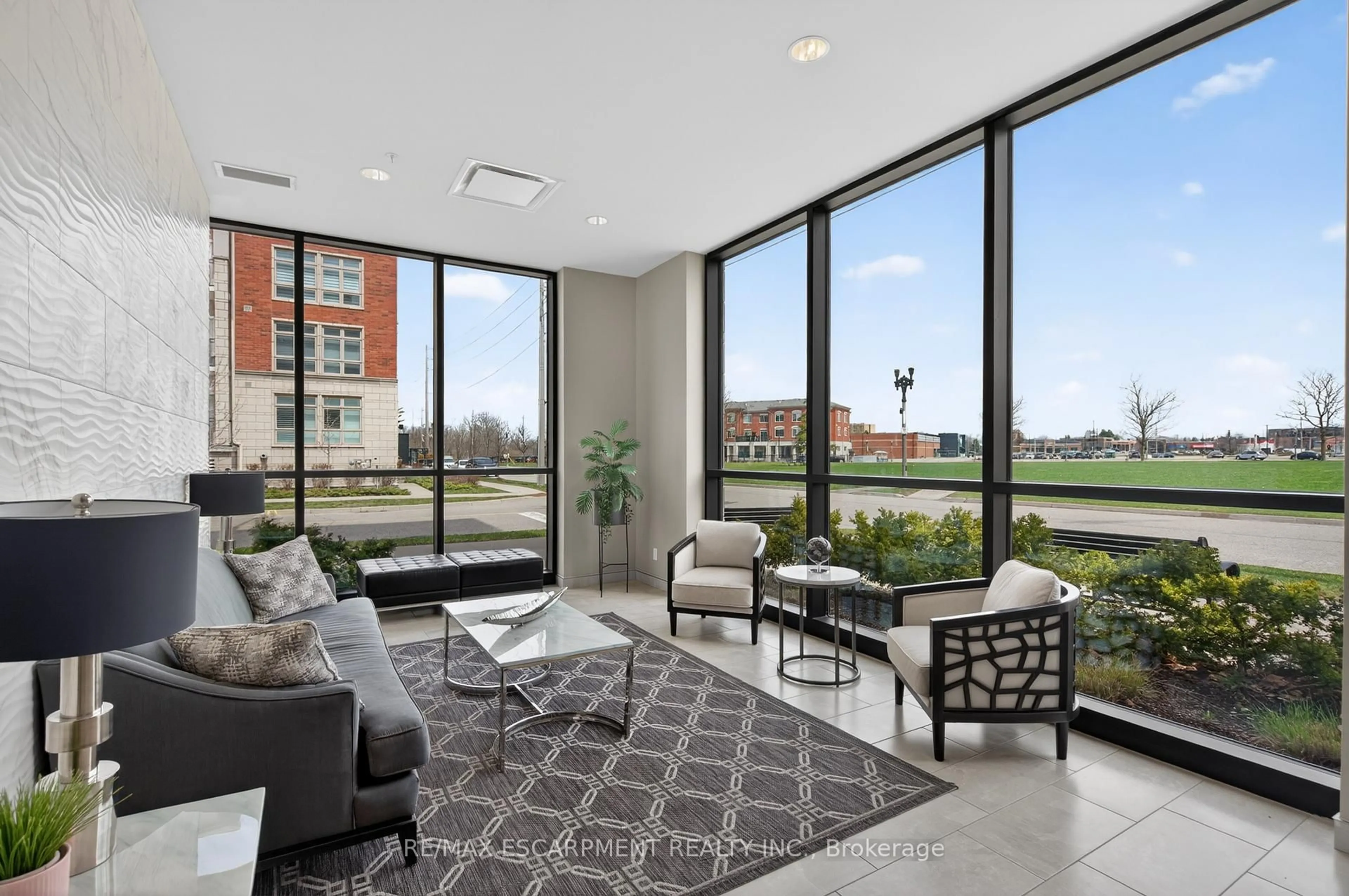 Living room with furniture, unknown for 175 Commonwealth St #202, Kitchener Ontario N2E 0H4