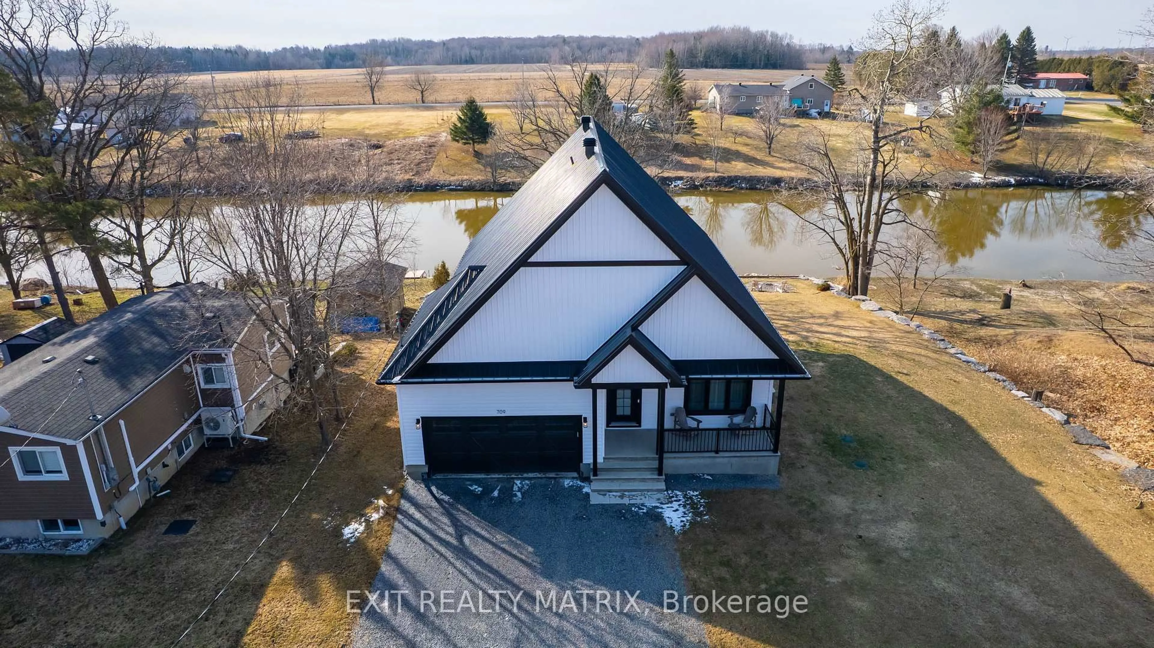 A pic from outside/outdoor area/front of a property/back of a property/a pic from drone, water/lake/river/ocean view for 709 Lebrun St, The Nation Ontario K0A 1M0