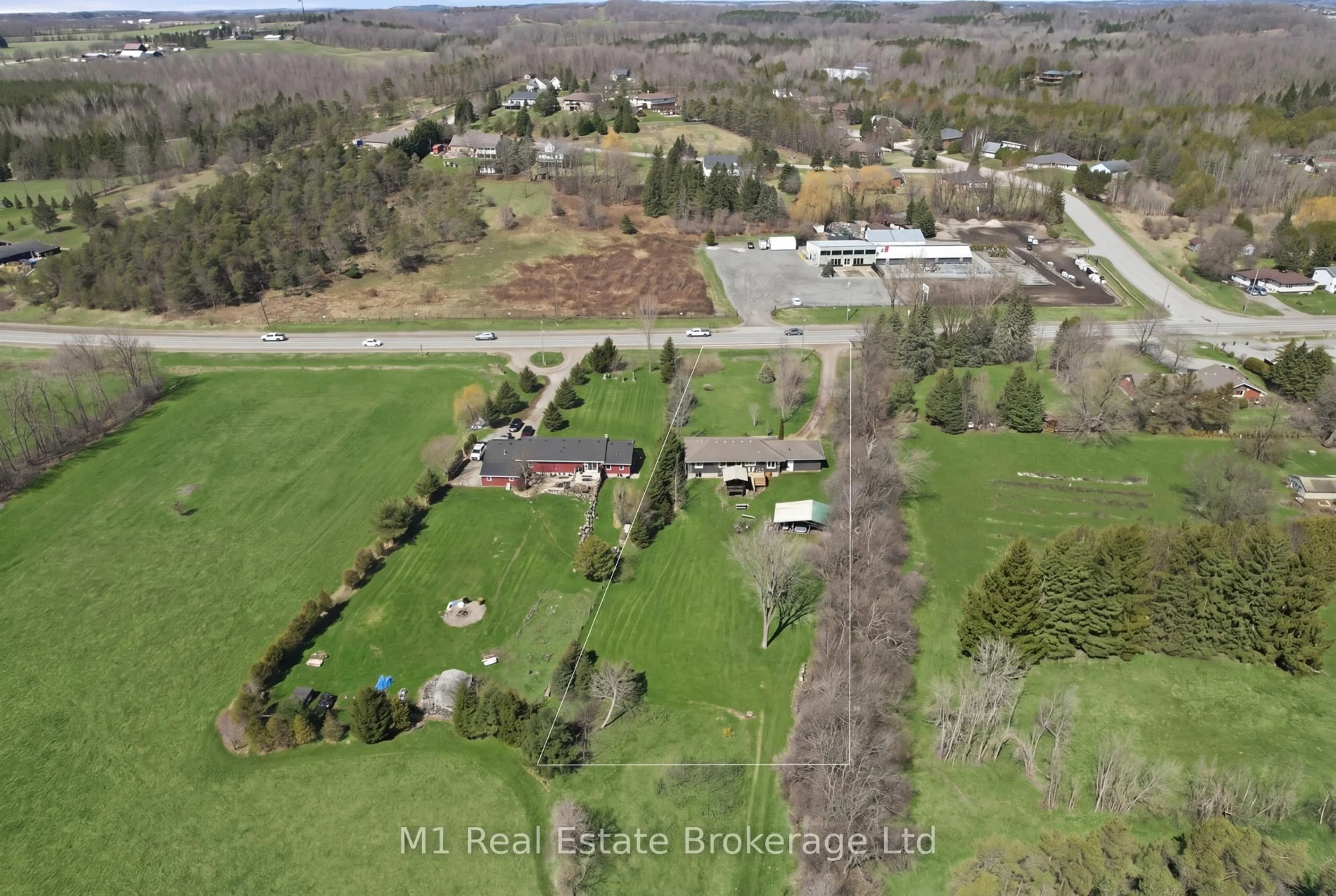 A pic from outside/outdoor area/front of a property/back of a property/a pic from drone, street for 9467 Wellington Rd 124, Erin Ontario N0B 1T0