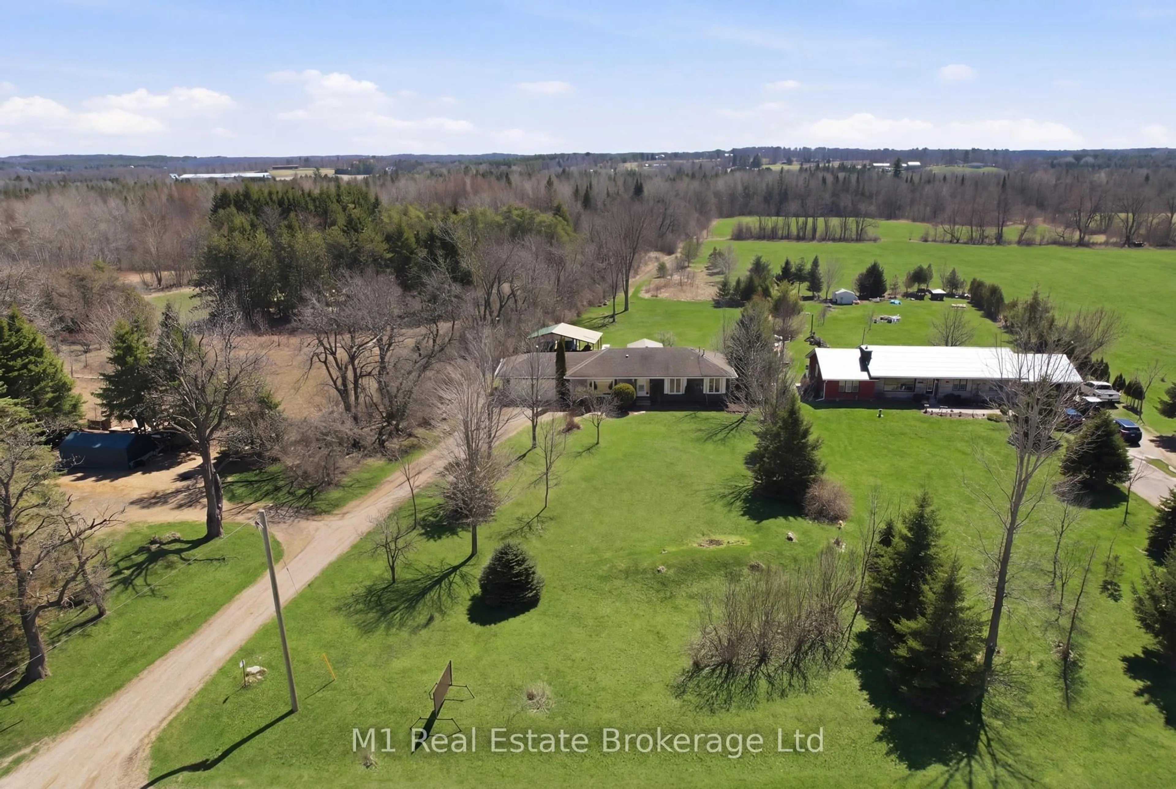 A pic from outside/outdoor area/front of a property/back of a property/a pic from drone, water/lake/river/ocean view for 9467 Wellington Rd 124, Erin Ontario N0B 1T0