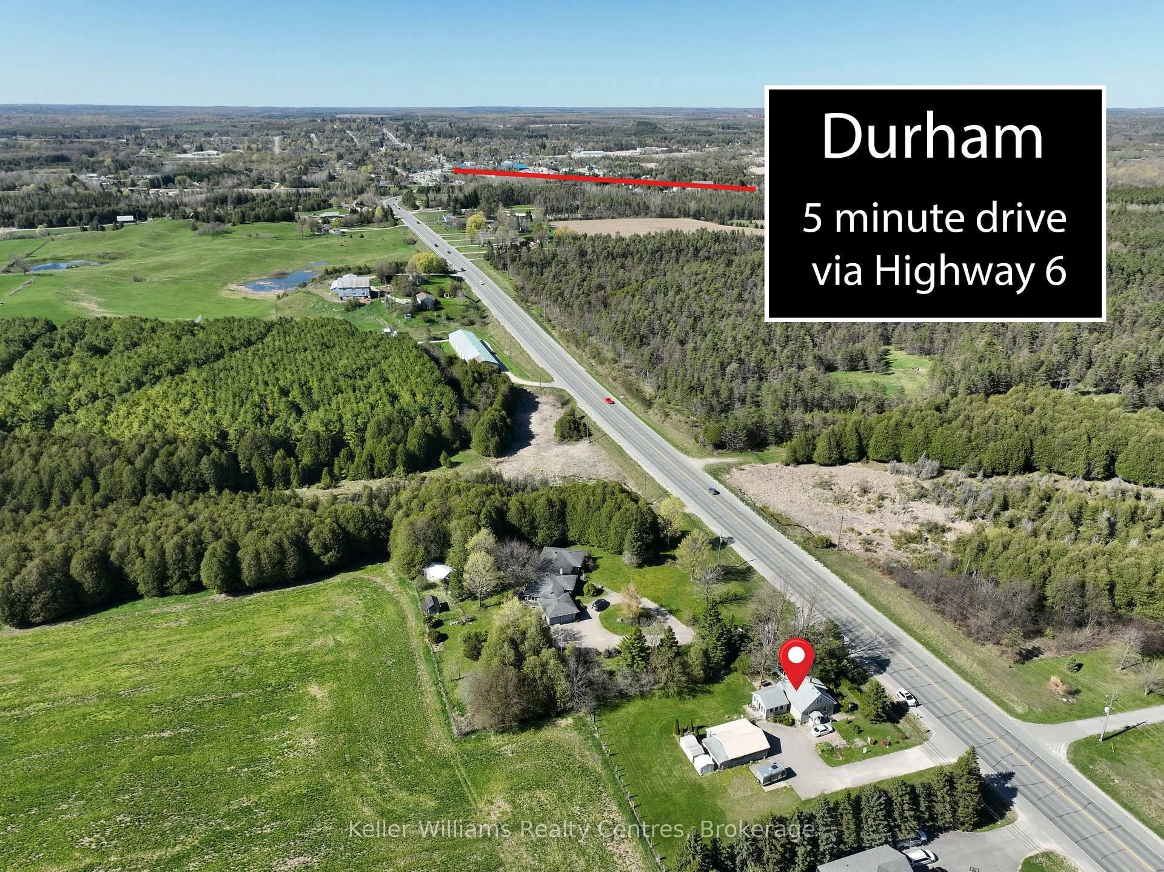 A pic from outside/outdoor area/front of a property/back of a property/a pic from drone, mountain view for 313238 Highway 6 Highway, West Grey Ontario N0G 1R0