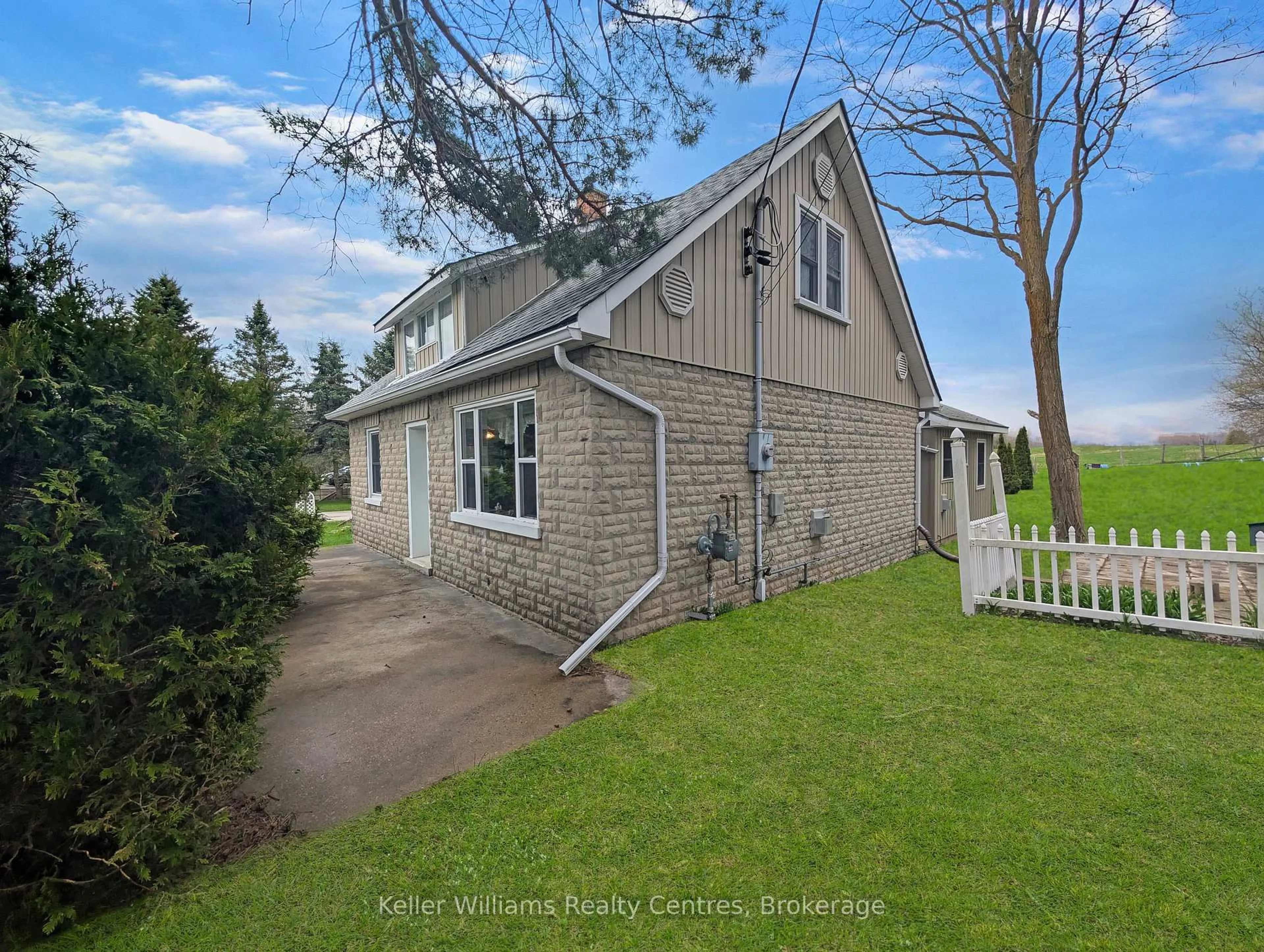 A pic from outside/outdoor area/front of a property/back of a property/a pic from drone, street for 313238 Highway 6 Highway, West Grey Ontario N0G 1R0