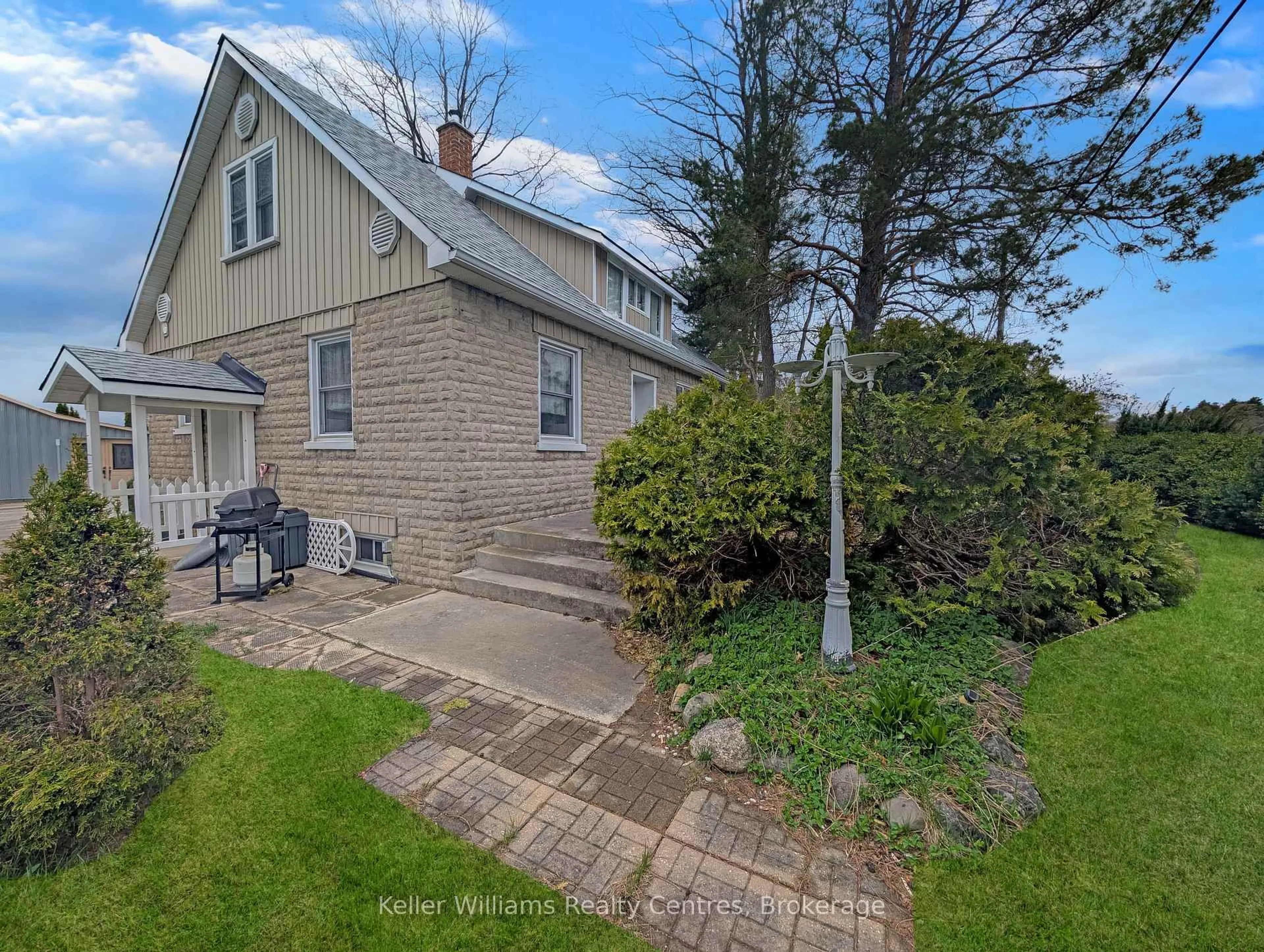 A pic from outside/outdoor area/front of a property/back of a property/a pic from drone, street for 313238 Highway 6 Highway, West Grey Ontario N0G 1R0