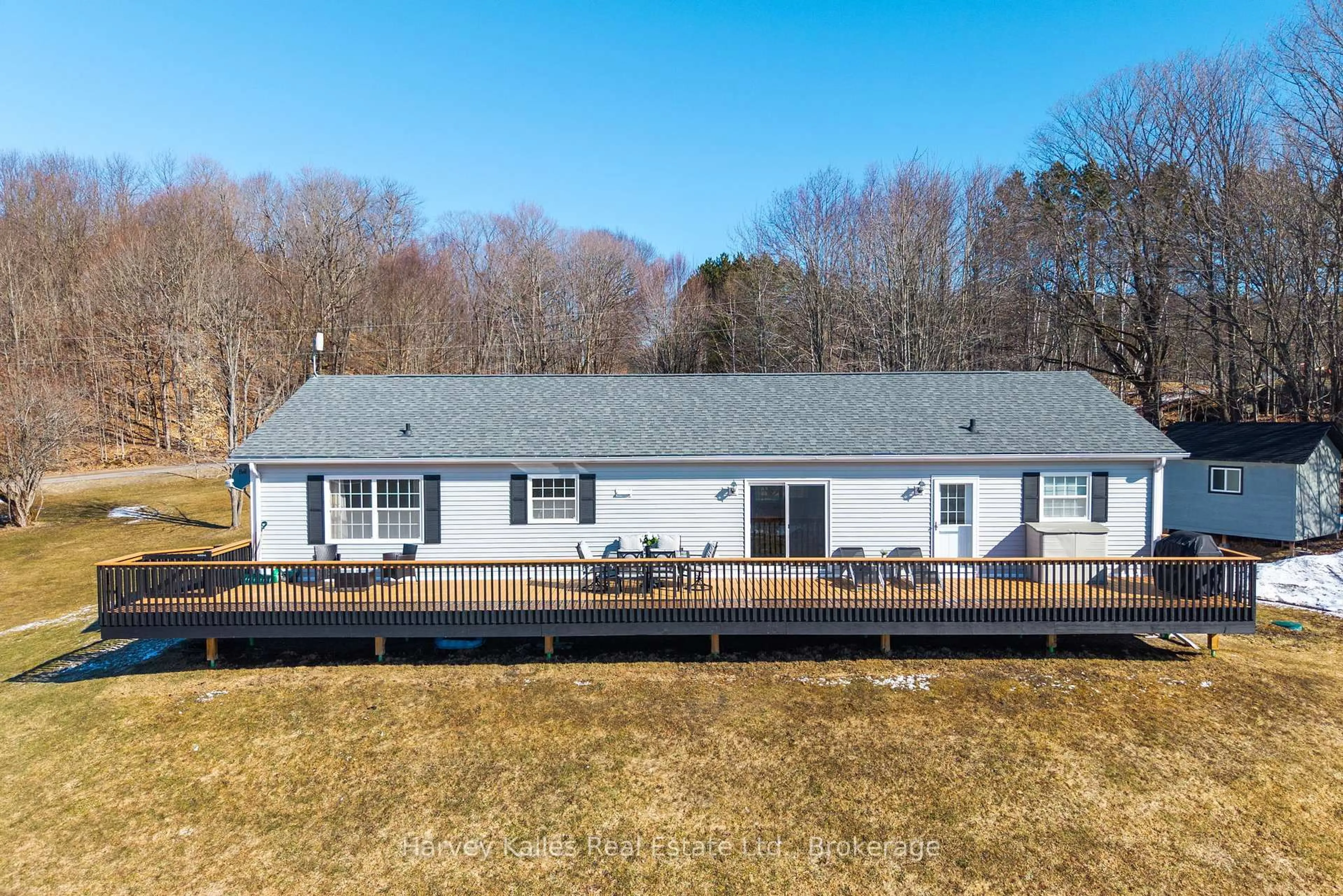 A pic from outside/outdoor area/front of a property/back of a property/a pic from drone, water/lake/river/ocean view for 1120 Shea Rd, Muskoka Lakes Ontario P0B 1M0