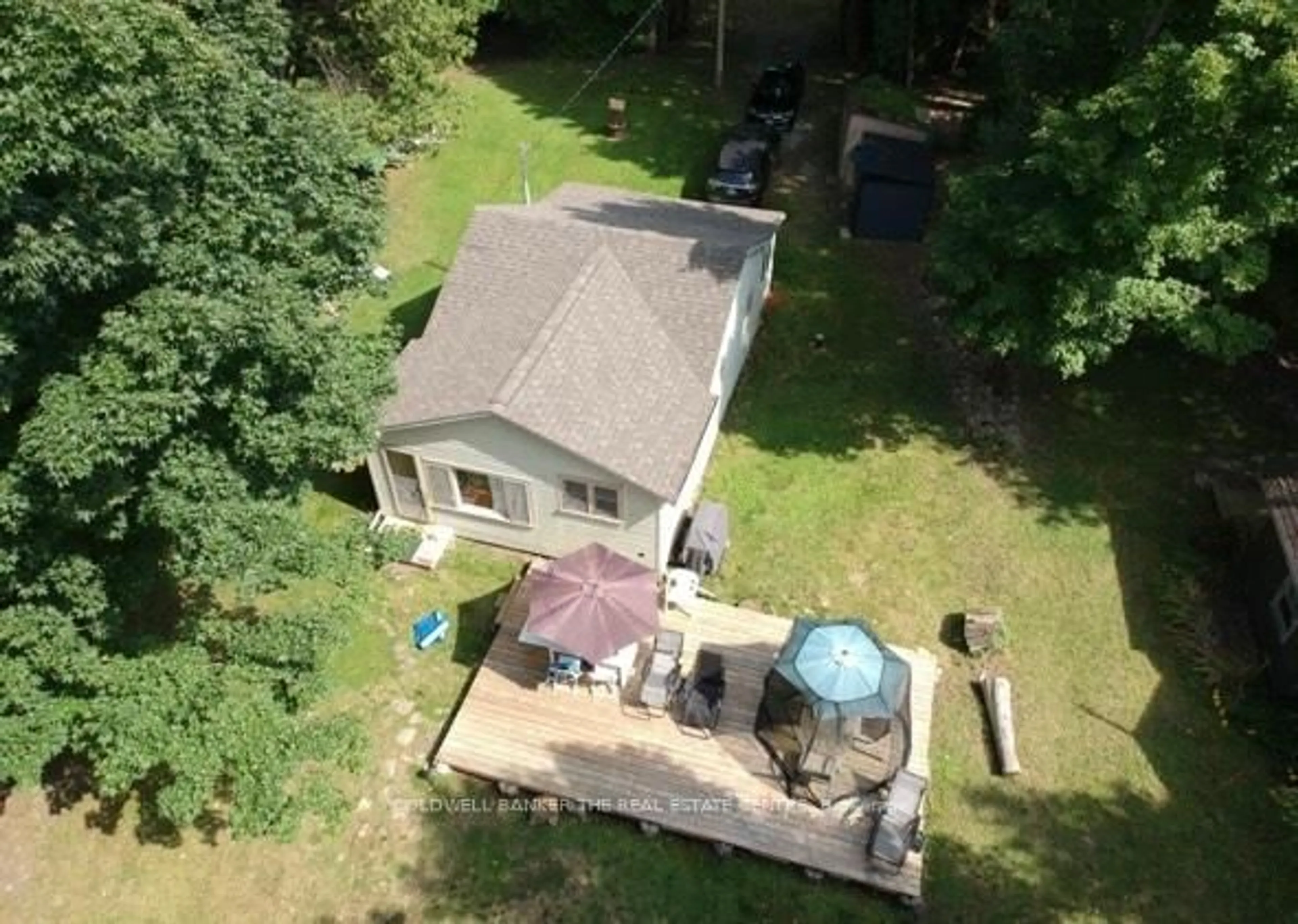 A pic from outside/outdoor area/front of a property/back of a property/a pic from drone, building for 227 Sunset Beach Rd, Kawartha Lakes Ontario K0M 2B0