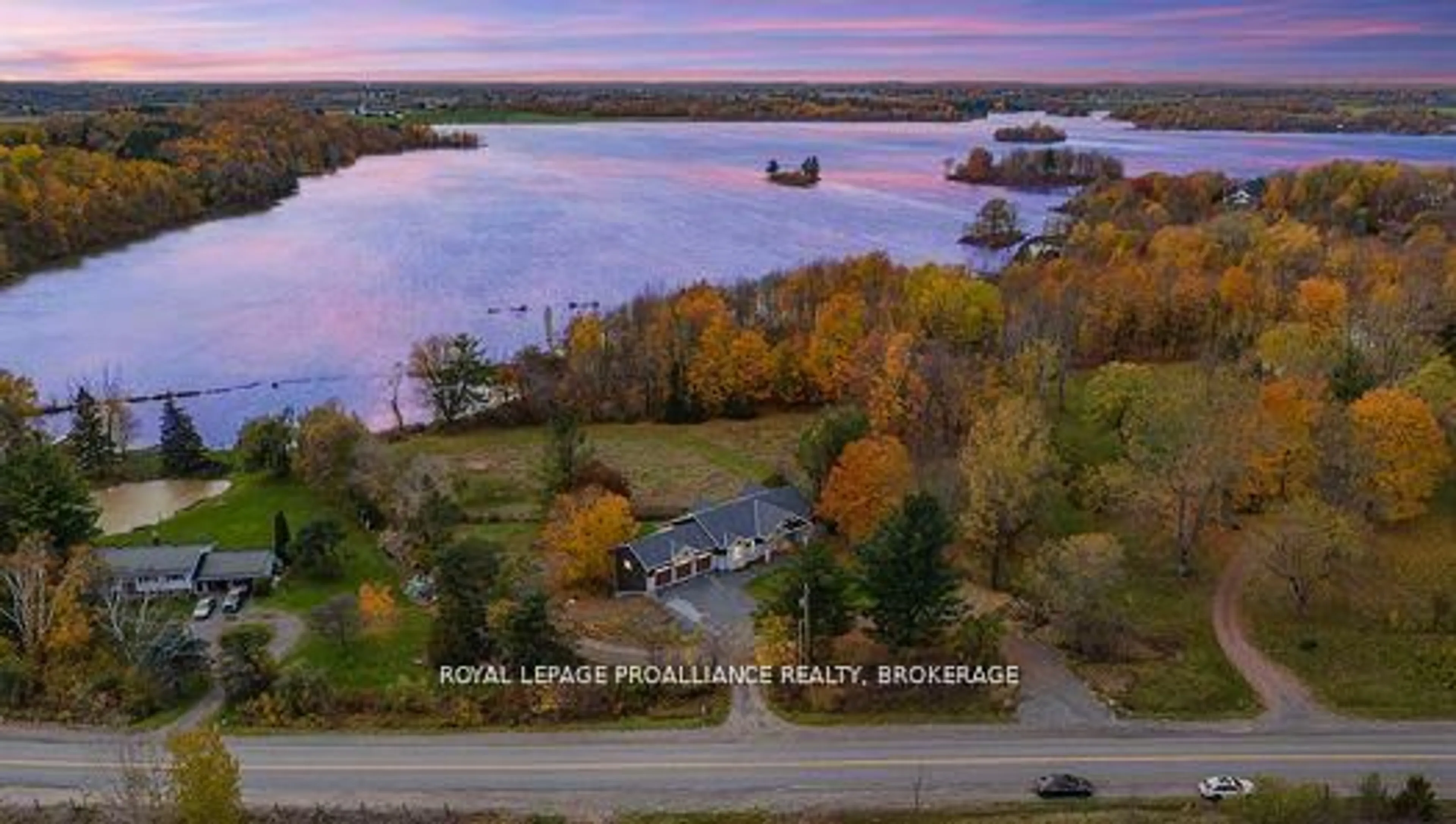 A pic from outside/outdoor area/front of a property/back of a property/a pic from drone, water/lake/river/ocean view for 1888 Sunbury Rd, Inverary Ontario K0H 1X0