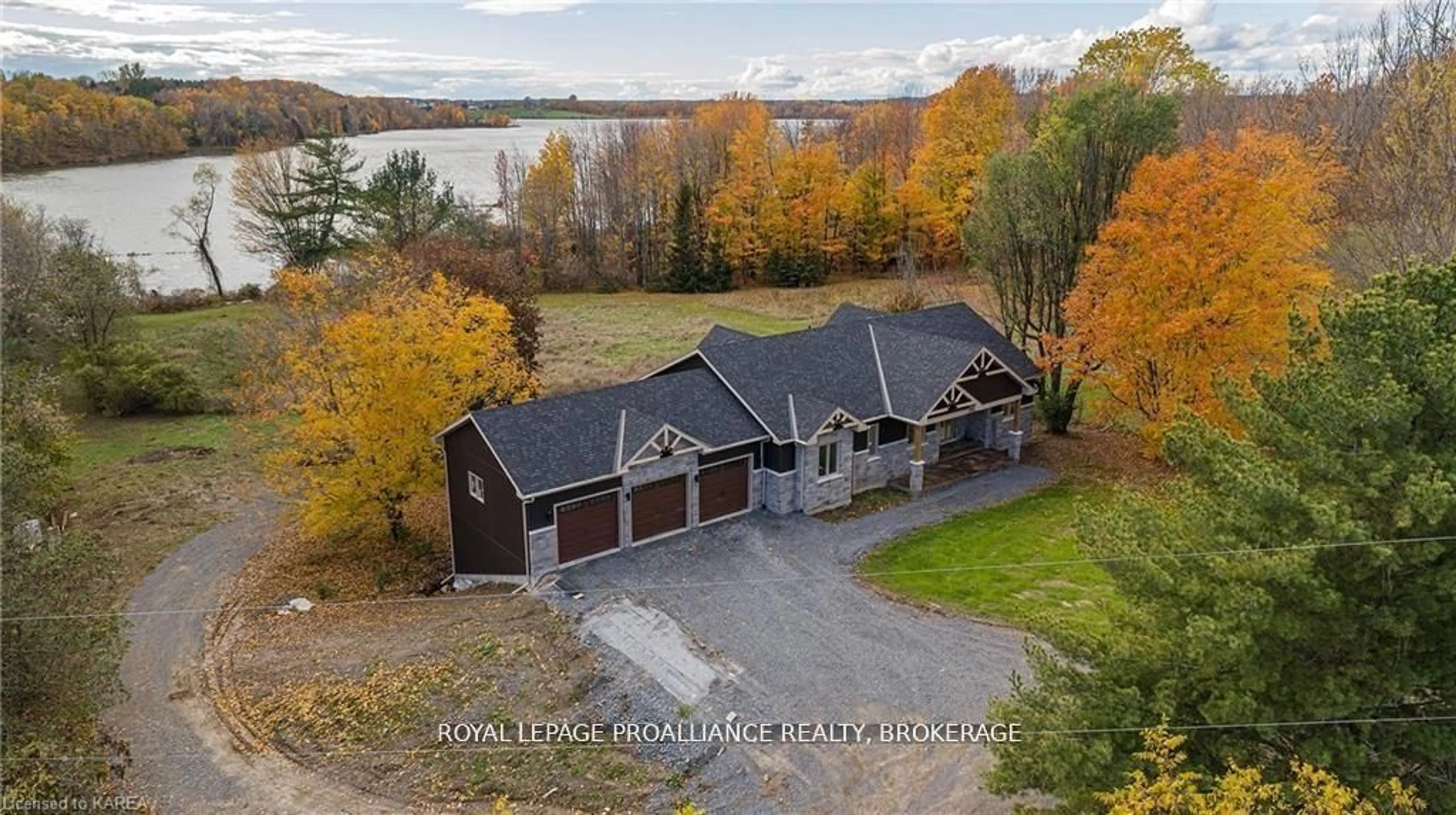 A pic from outside/outdoor area/front of a property/back of a property/a pic from drone, water/lake/river/ocean view for 1888 Sunbury Rd, Inverary Ontario K0H 1X0