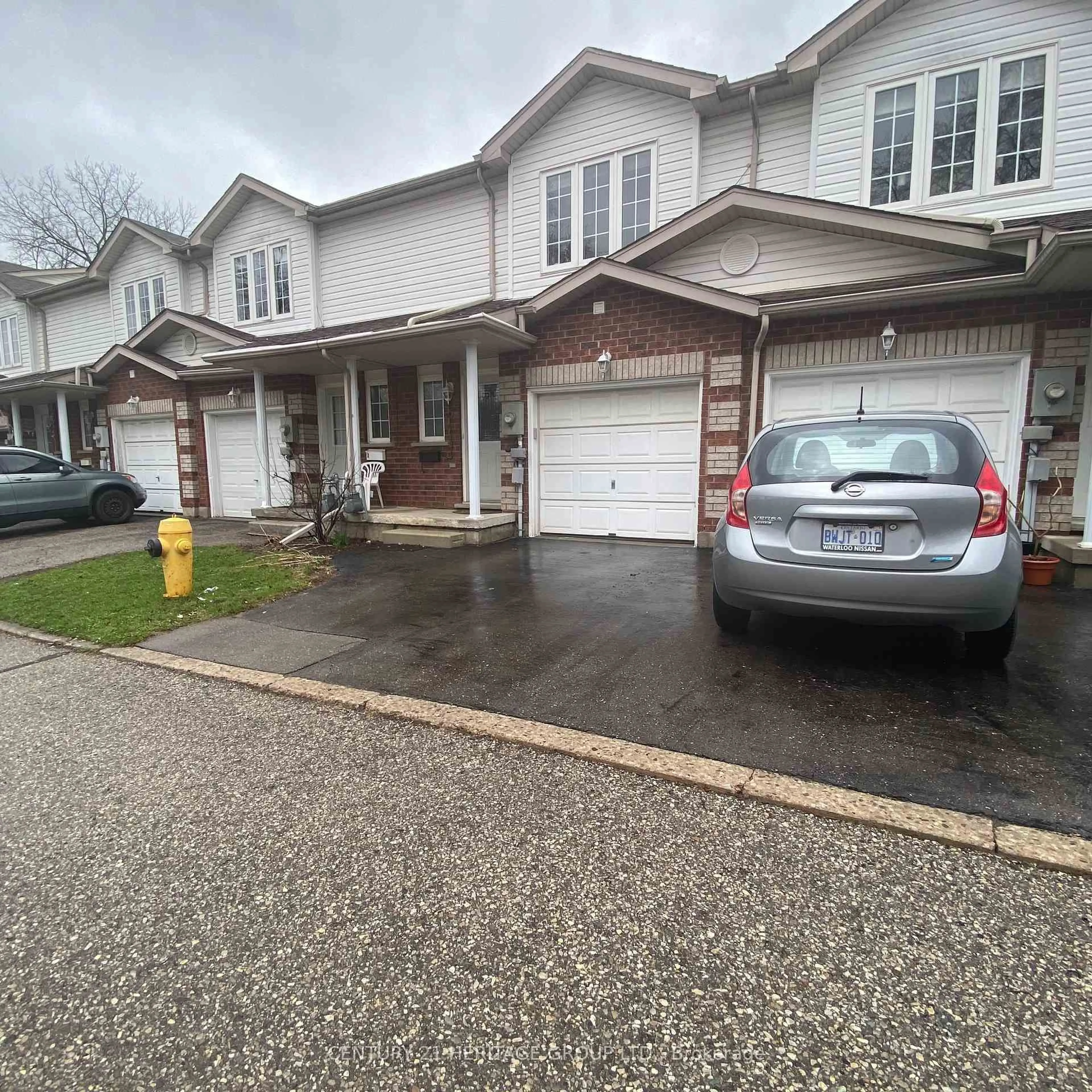 A pic from outside/outdoor area/front of a property/back of a property/a pic from drone, street for 317 Mill St #6, Kitchener Ontario N2M 3R8