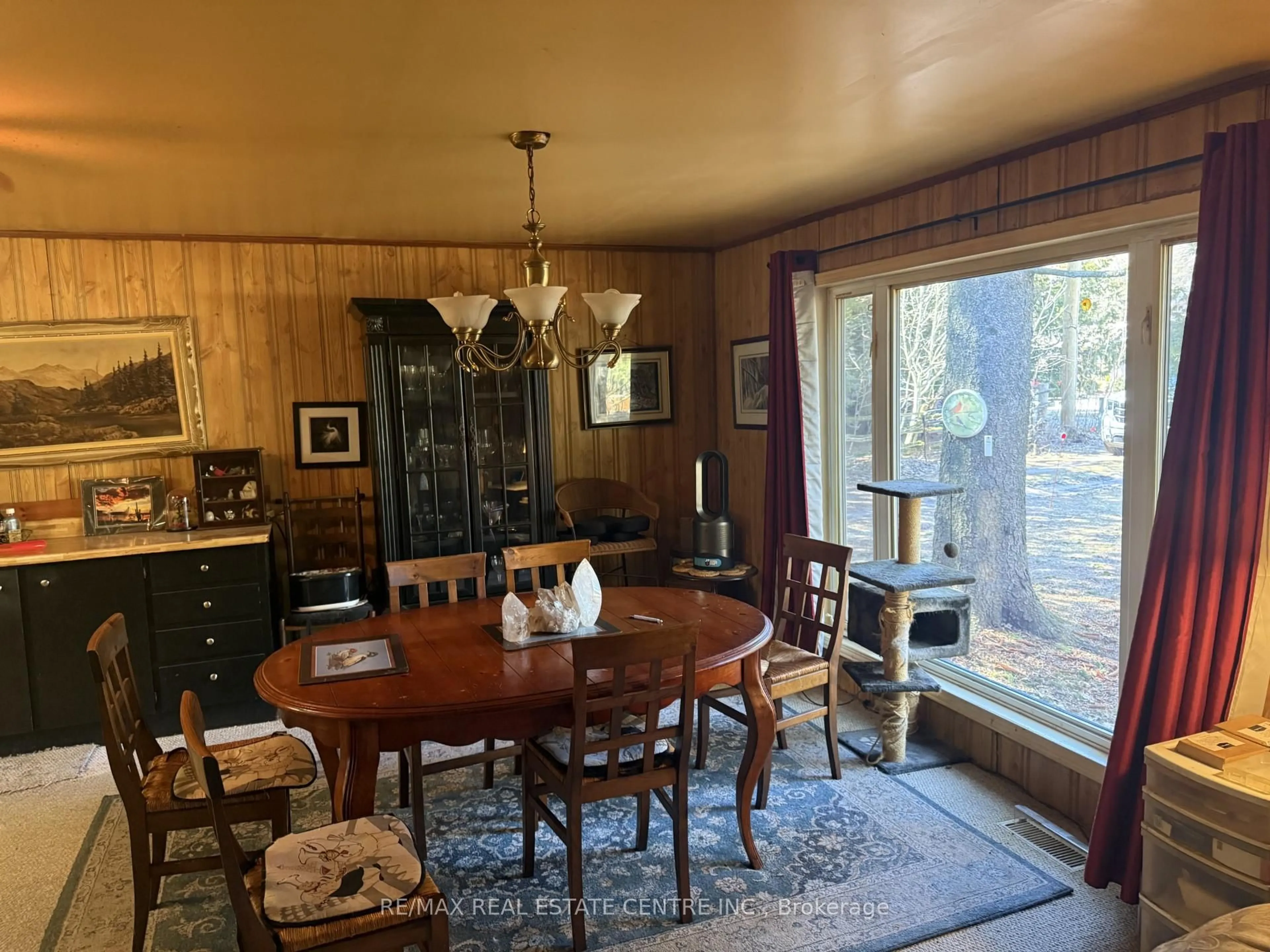 Dining room, wood/laminate floor for 21 Mccutcheon Rd, Mulmur Ontario L9V 3E8