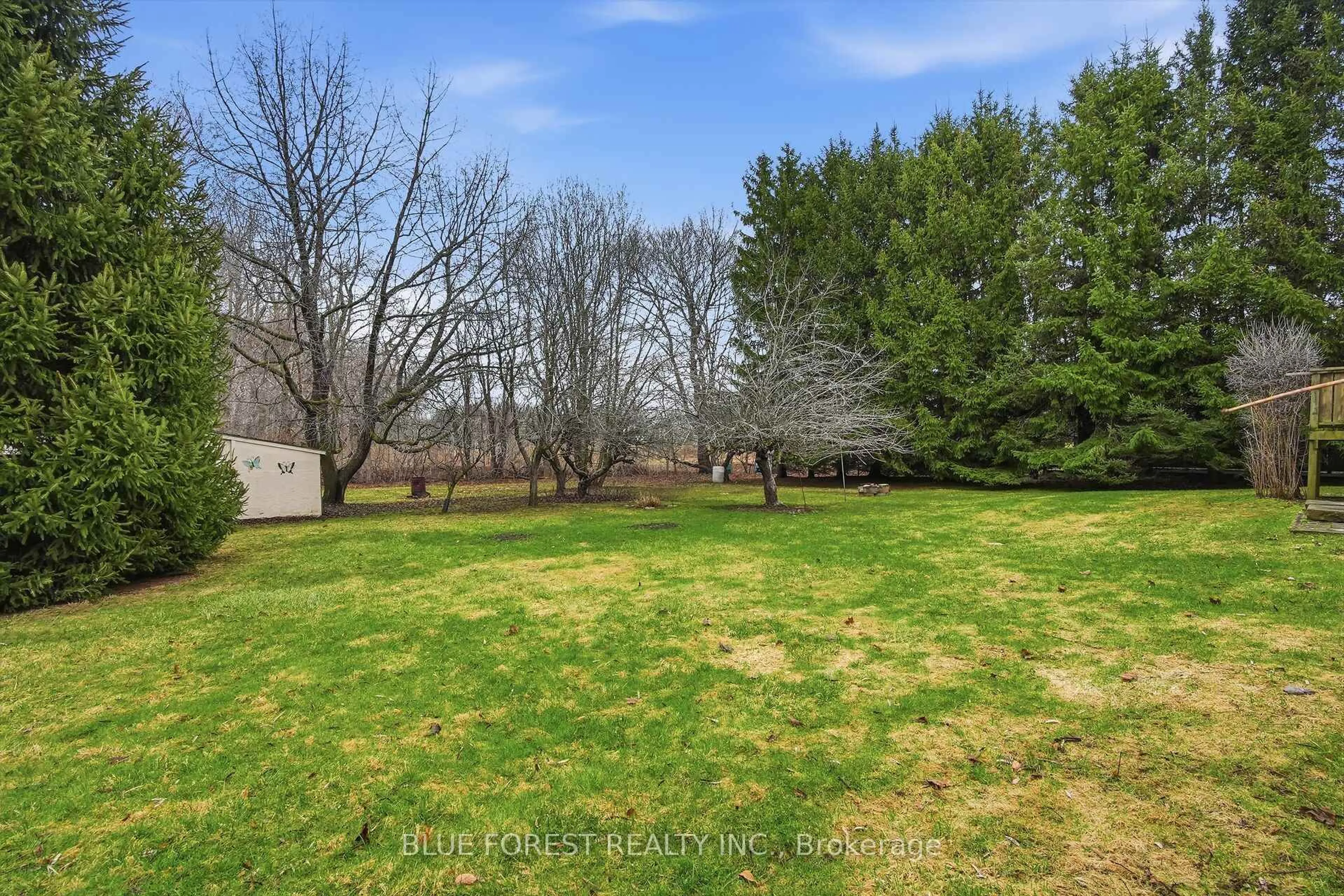 A pic from outside/outdoor area/front of a property/back of a property/a pic from drone, forest/trees view for 1668 Hamilton Rd, London East Ontario N6M 1G4