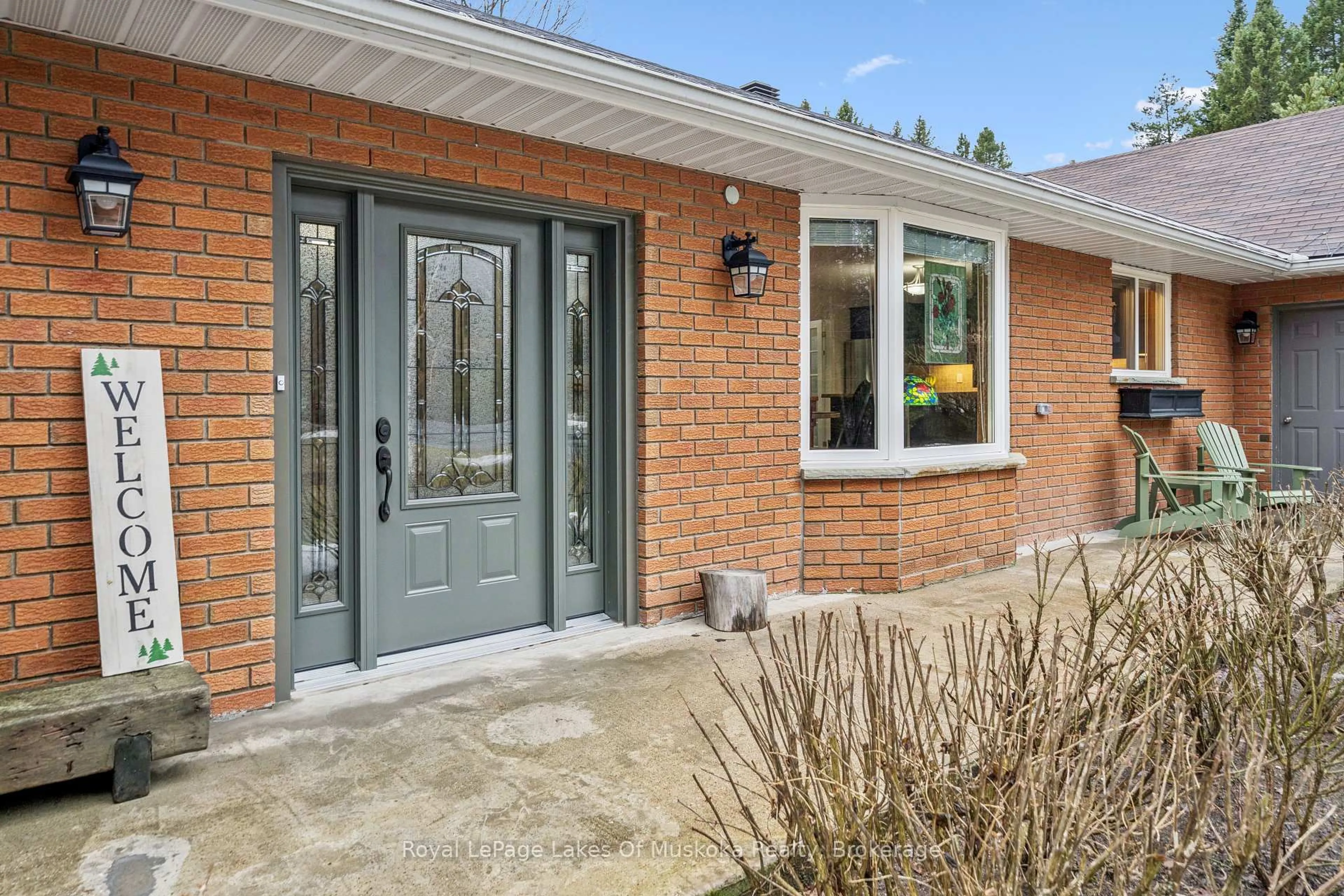 Home with brick exterior material, street for 87 Laneige Ave, Huntsville Ontario P0B 1L0
