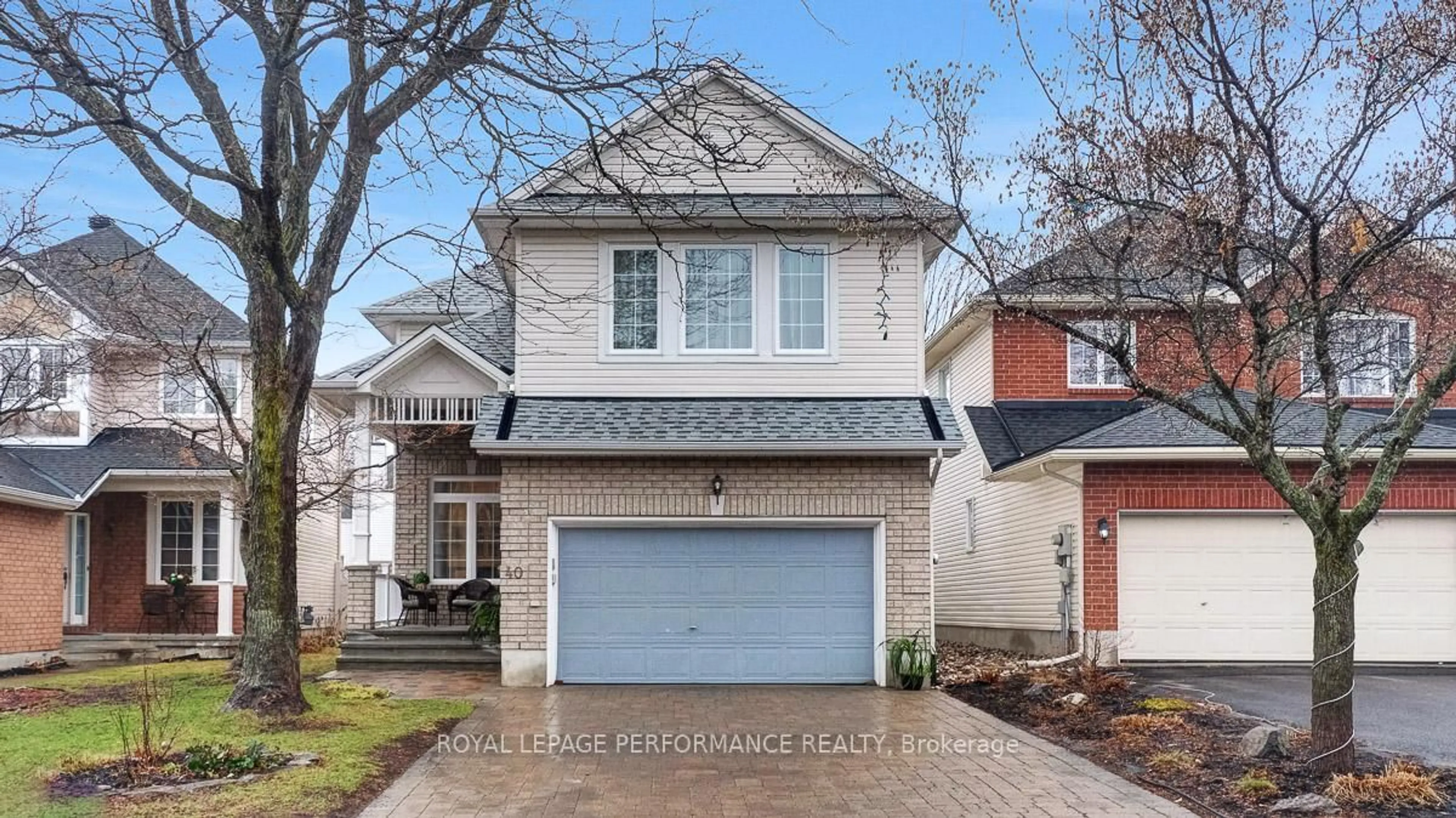Home with brick exterior material, street for 40 Rivergreen Cres, Ottawa Ontario K2M 2W9