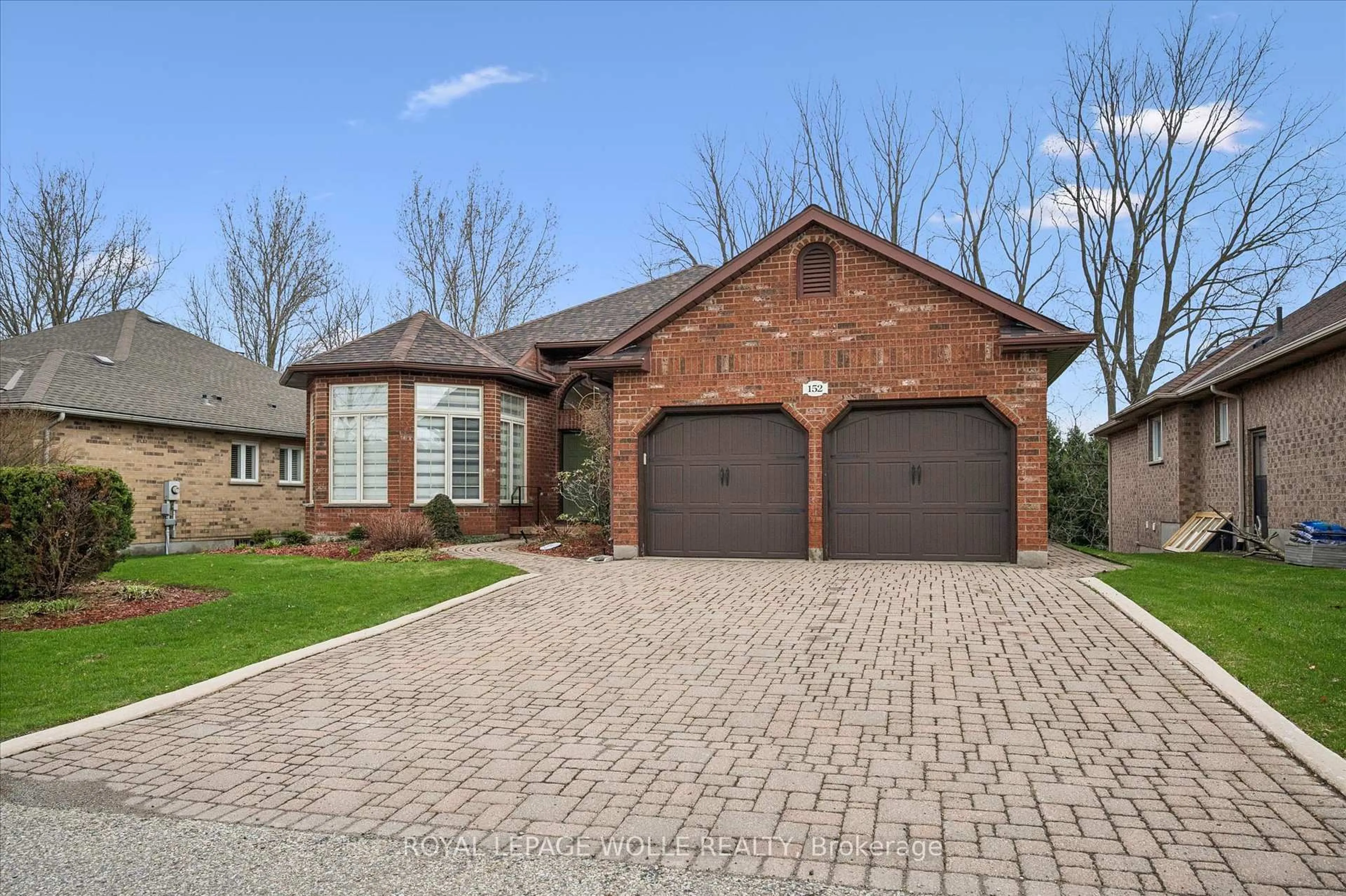 Home with brick exterior material, street for 152 Golf Links Dr, Wilmot Ontario N3A 3P1
