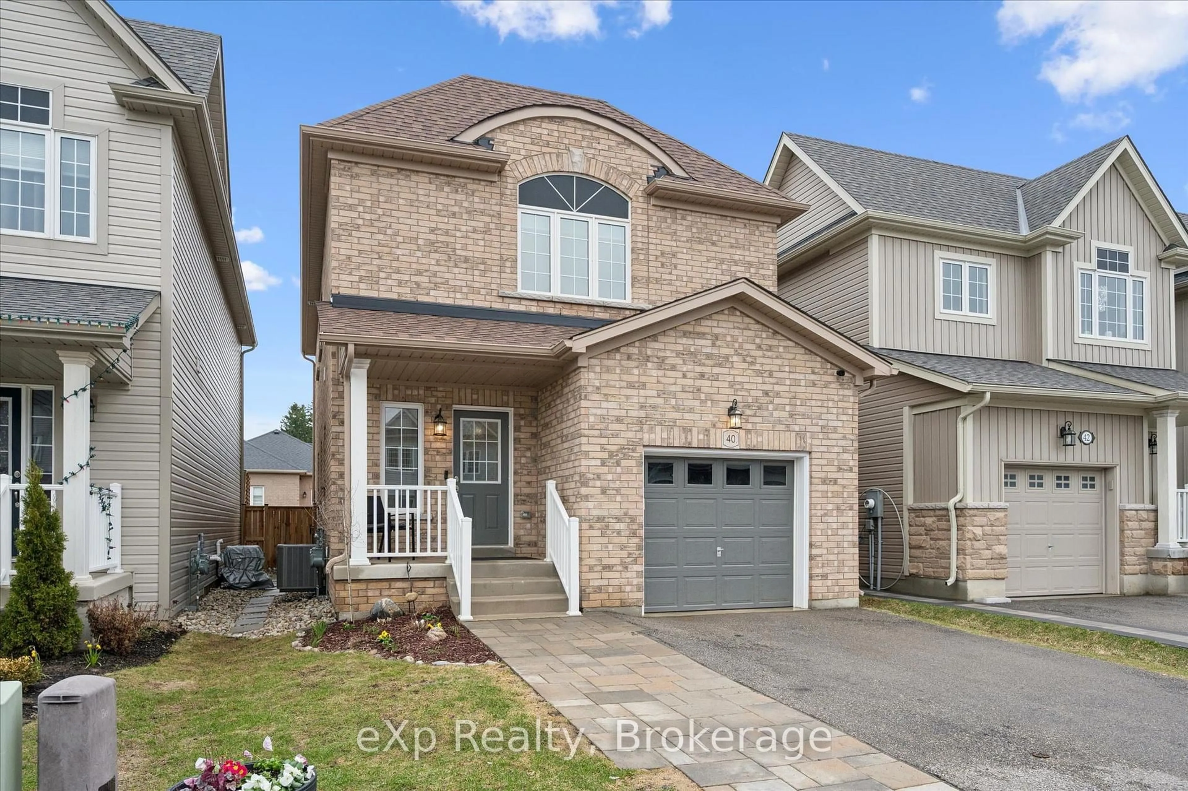 Home with brick exterior material, street for 40 Courtney St, Centre Wellington Ontario N1M 0E5