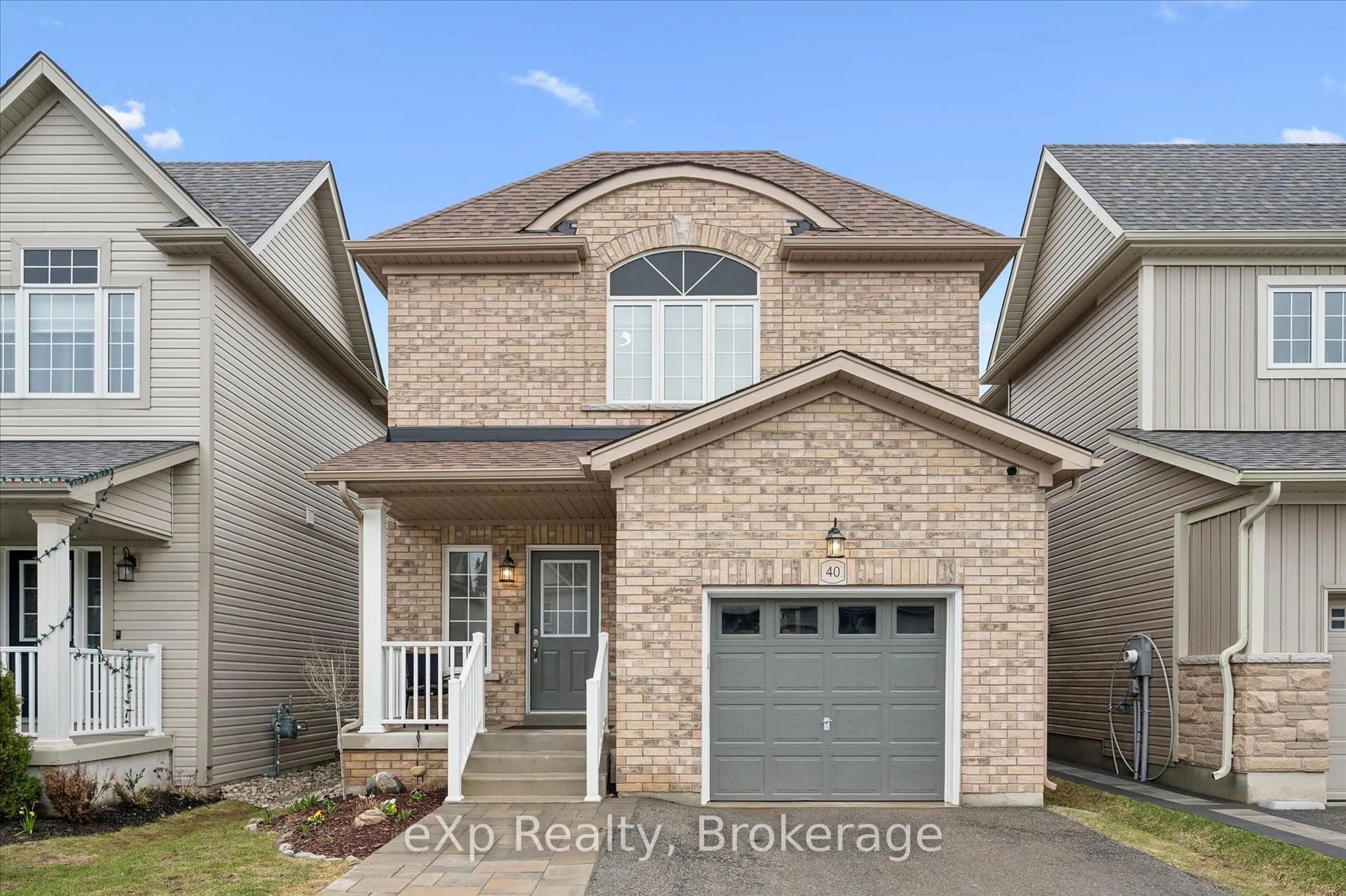 Home with brick exterior material, street for 40 Courtney St, Centre Wellington Ontario N1M 0E5