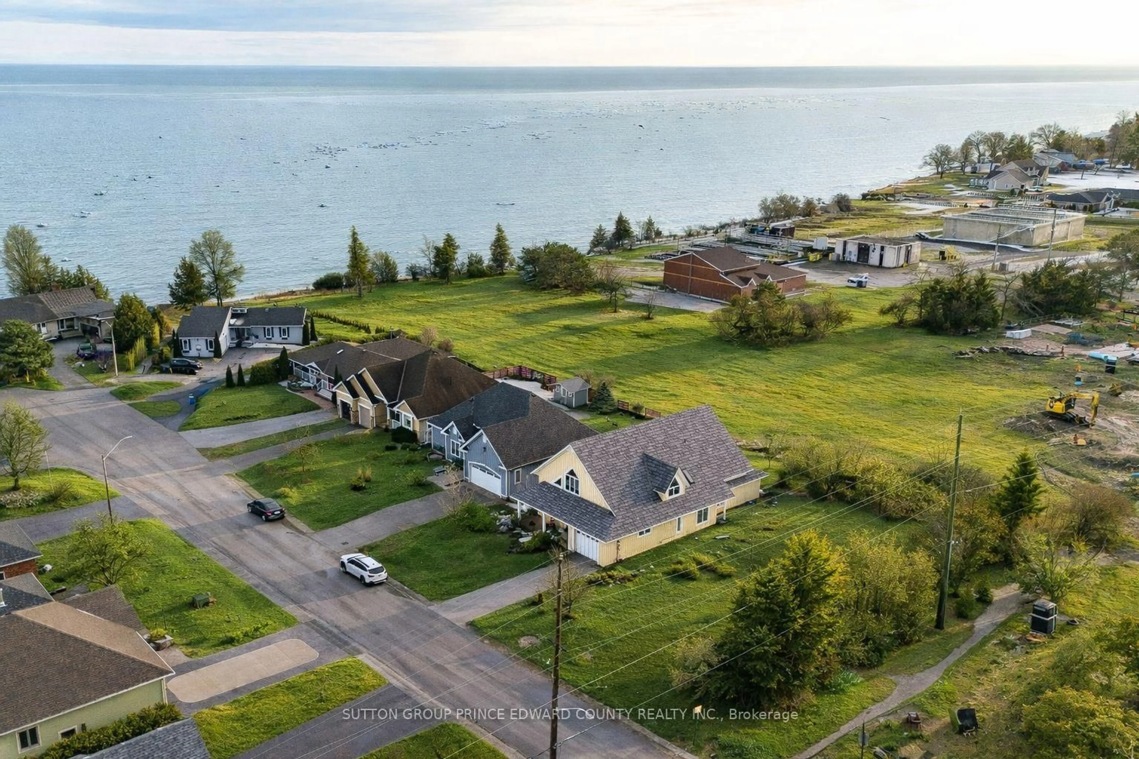 A pic from outside/outdoor area/front of a property/back of a property/a pic from drone, water/lake/river/ocean view for 4 Carla Crt, Prince Edward County Ontario K0K 3L0