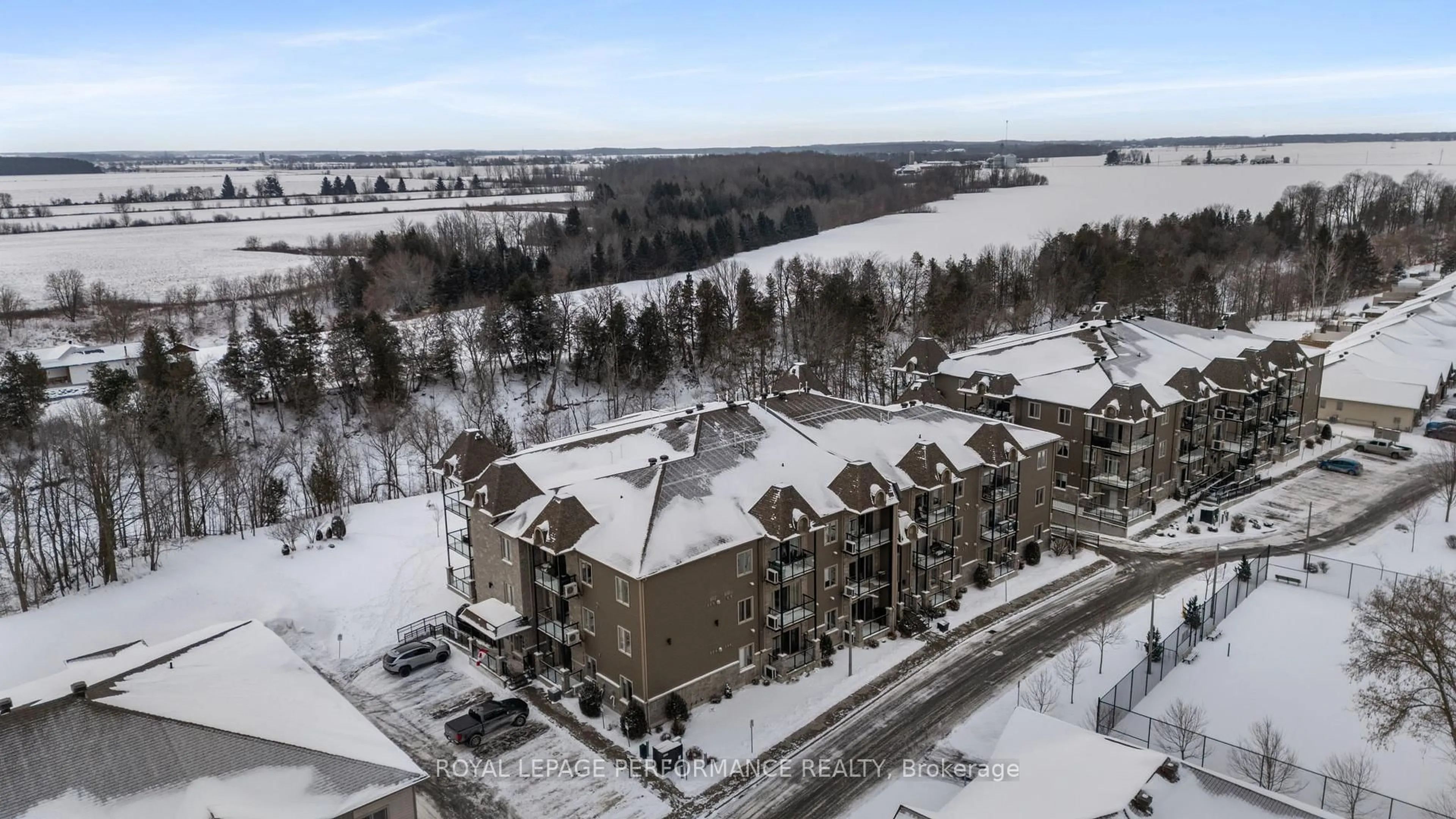 A pic from outside/outdoor area/front of a property/back of a property/a pic from drone, unknown for 300 Solstice Cres #205, Russell Ontario K0A 1W0
