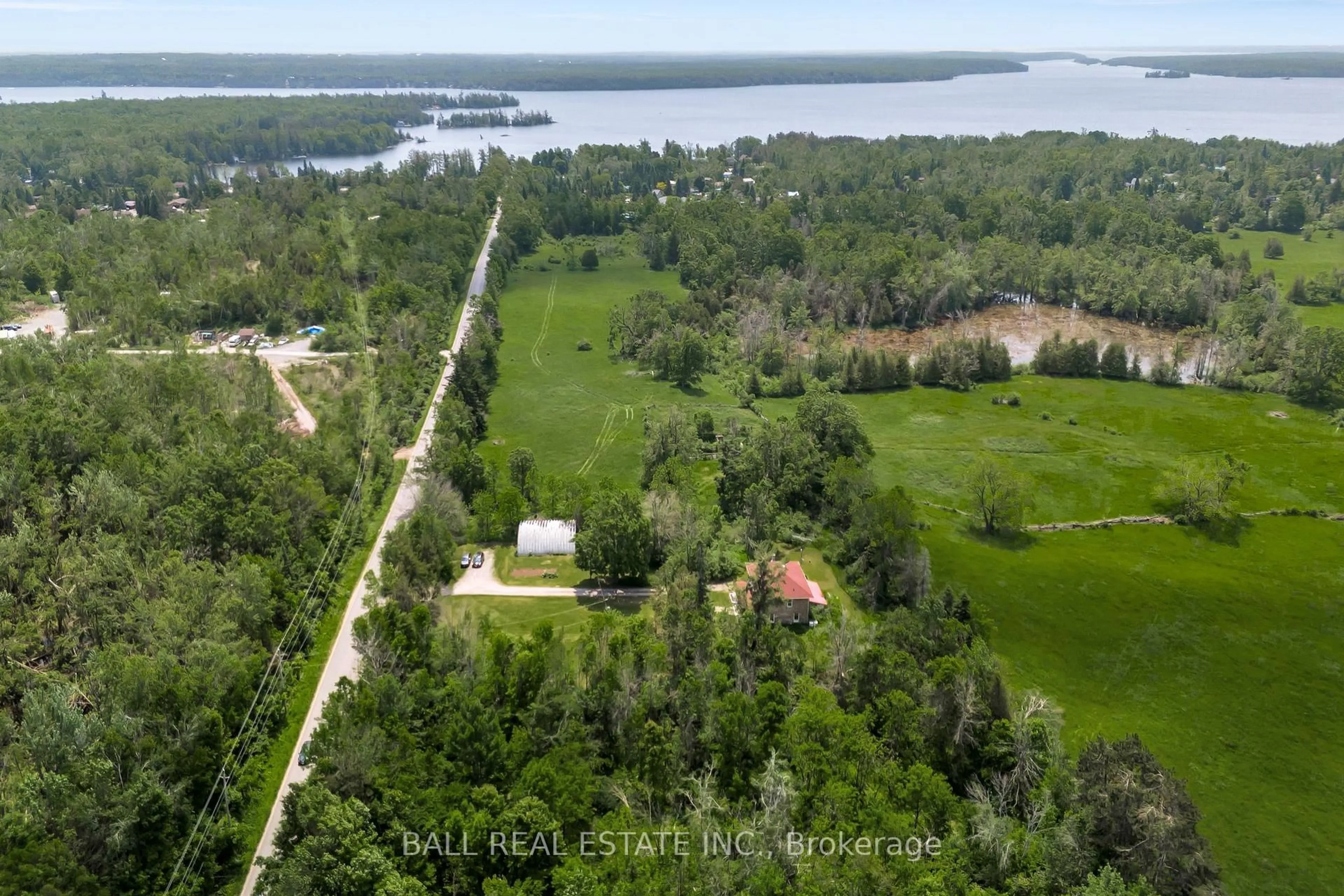 A pic from outside/outdoor area/front of a property/back of a property/a pic from drone, water/lake/river/ocean view for 108 Tates Bay Rd, Trent Lakes Ontario K0M 1A0