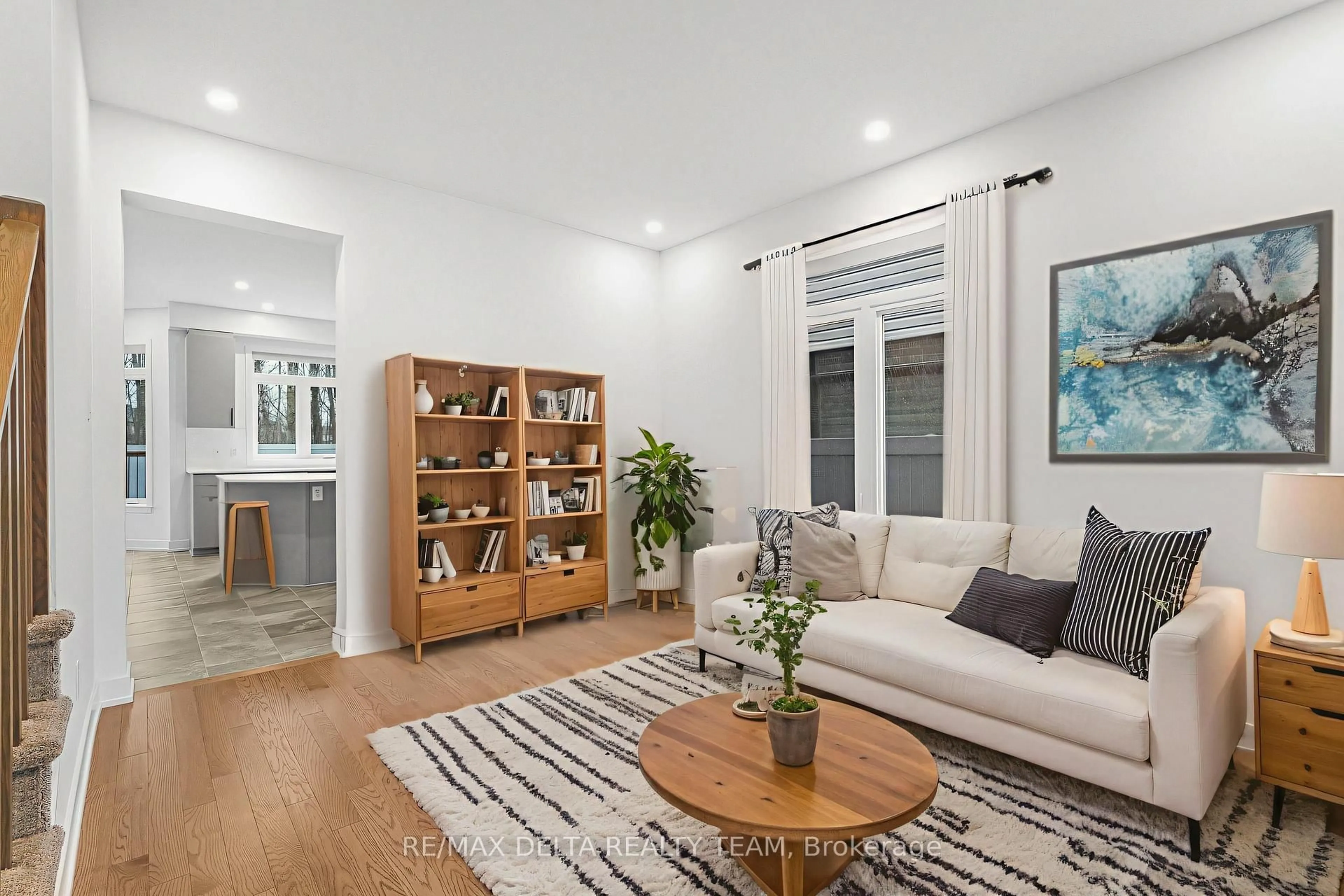 Living room with furniture, wood/laminate floor for 39 Angel Hts, Stittsville Ontario K2S 2N2