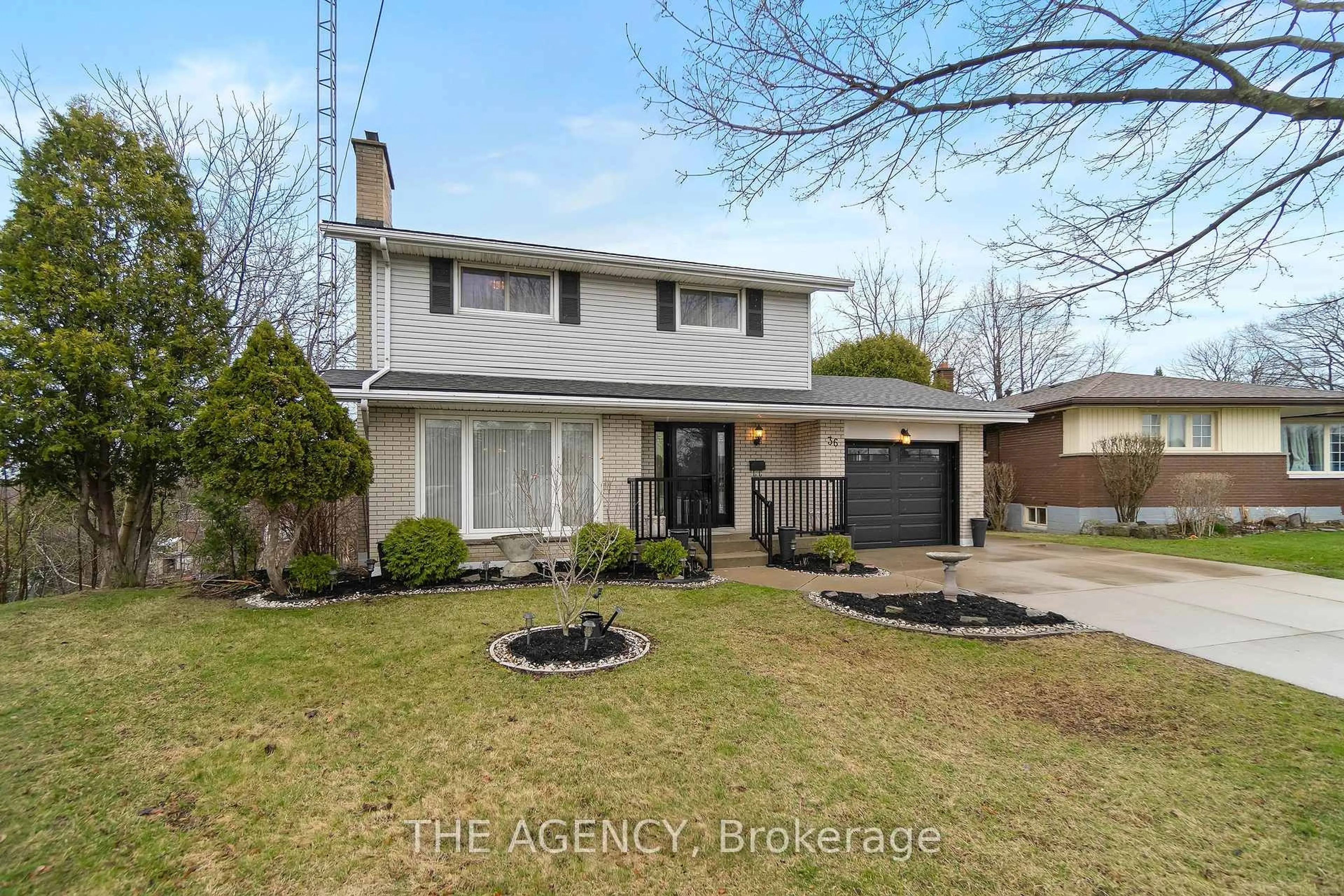 Home with vinyl exterior material, street for 36 Buckingham Dr, Hamilton Ontario L9C 2G5