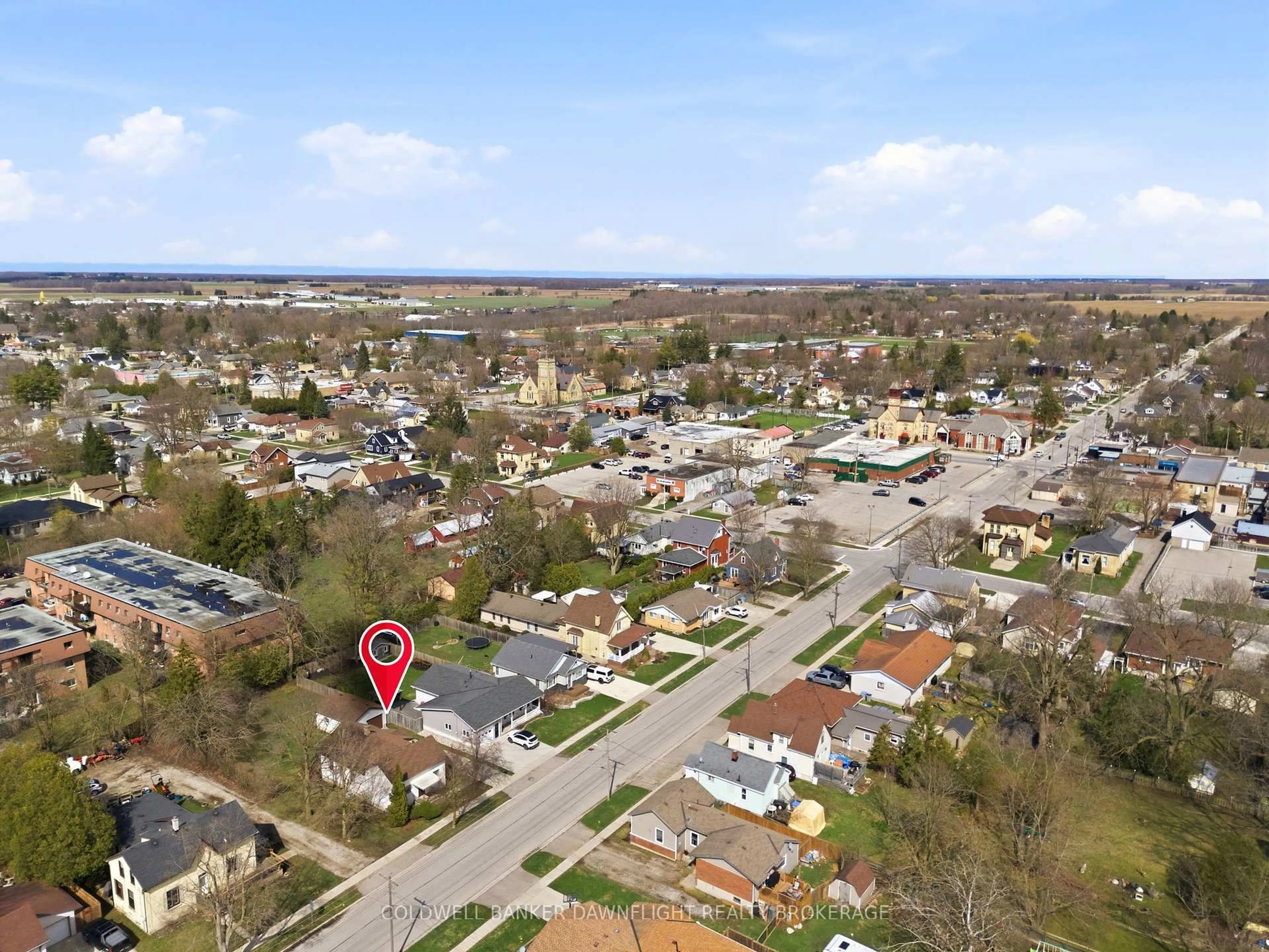 A pic from outside/outdoor area/front of a property/back of a property/a pic from drone, street for 80 Sanders St, South Huron Ontario N0M 1S2